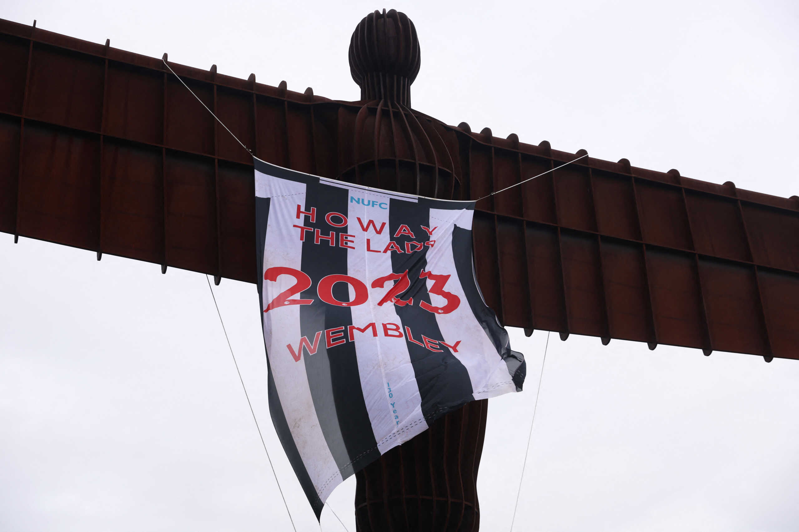 Soccer Football - Carabao Cup - Final - Manchester United v Newcastle United Preview - Gateshead, Britain - February 26, 2023 The Angel of the North is pictured with a Newcastle United banner ahead of tomorrows Carabao Cup final Action Images via Reuters