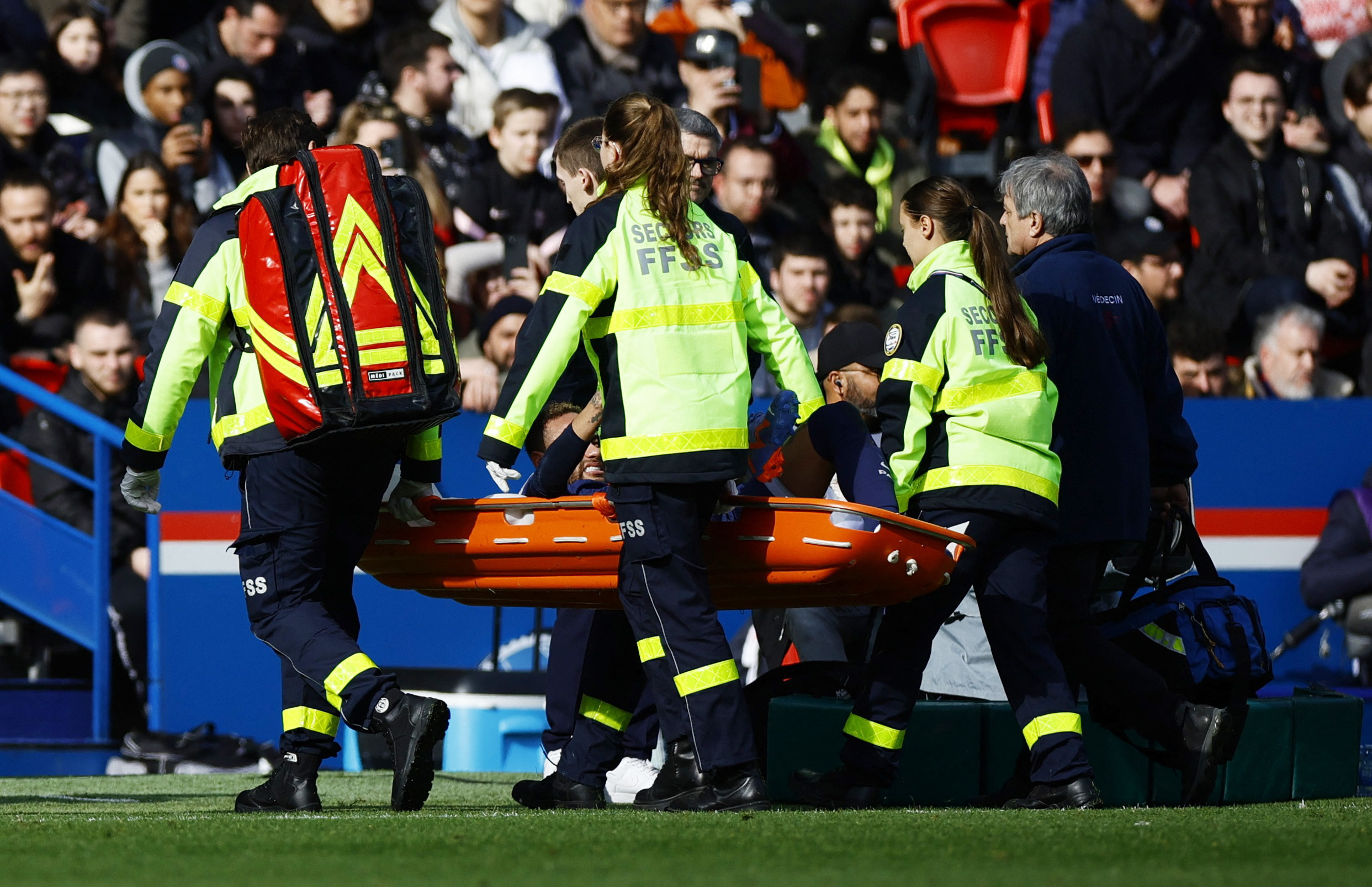 Soccer Football - Ligue 1 - Paris St Germain v Lille - Parc des Princes, Paris, France - February 19, 2023 Paris St Germain's Neymar is stretchered off after sustaining an injury REUTERS