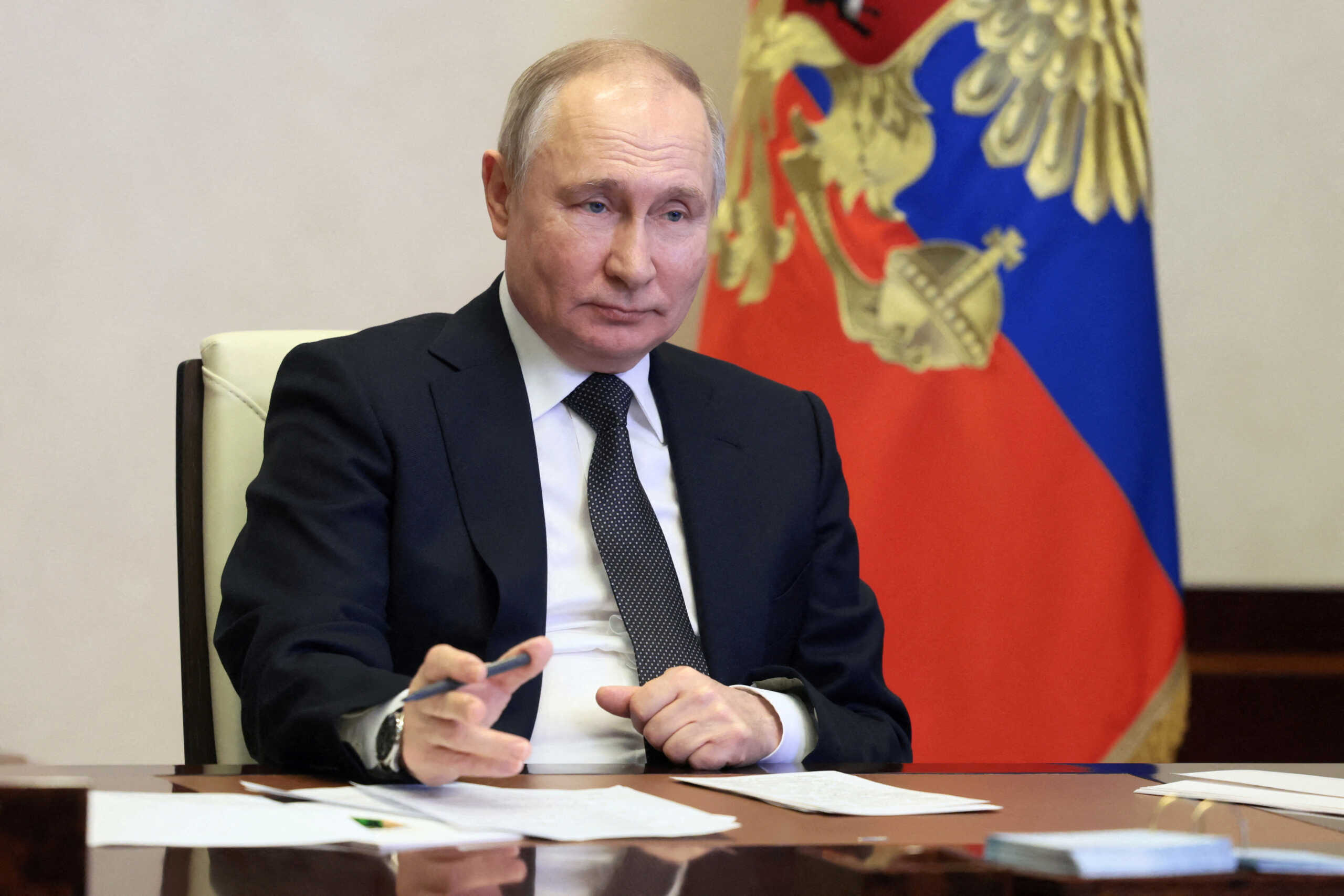 FILE PHOTO: Russia's President Vladimir Putin takes part in an event marking Gazprom's 30th anniversary, via video link at a residence outside Moscow, Russia February 17, 2023. Sputnik