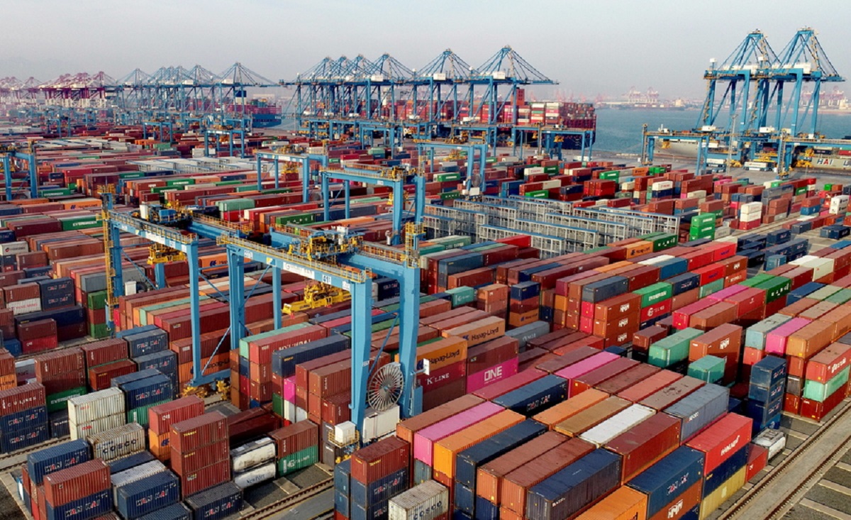 epa08867889 A view of a busy container port in Qingdao, Shandong province, China, 01 December 2020 (issued 07 December 2020). China's exports in November jumped by 21.1 percent by US dollar value from a year earlier, with exports to the United States rose 46 percent to make a record 75.4 billion US dollar trade surplus with the US.  EPA
