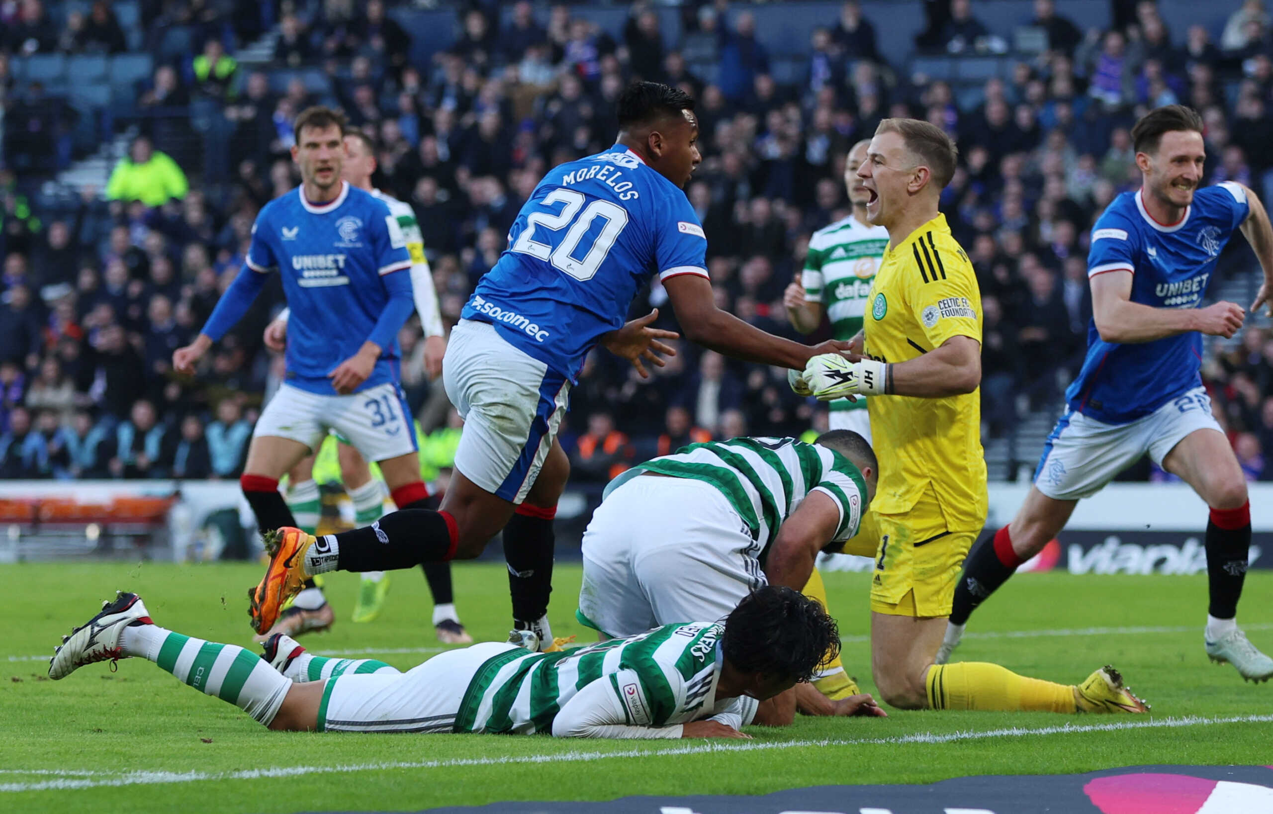 Soccer Football - Scottish League Cup - Final - Rangers v Celtic - Hampden Park, Glasgow, Scotland, Britain - February 26, 2023 Rangers' Alfredo Morelos celebrates scoring their first goal as Celtic's Joe Hart reacts Action Images via Reuters
