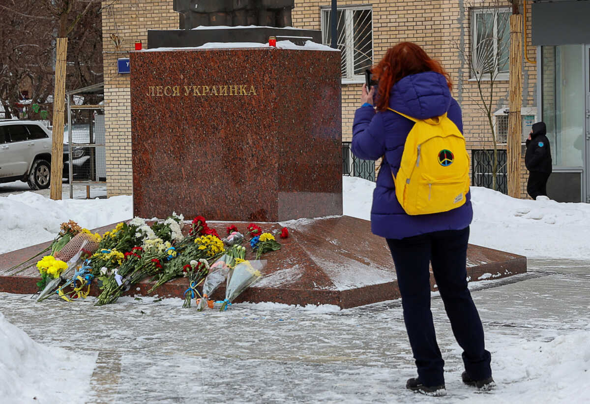 A visitor stands in front of a monument to Ukrainian poet Lesya Ukrainka on the first anniversary of the beginning of Russia's military campaign in Ukraine, in Moscow, Russia, February 24, 2023. REUTERS