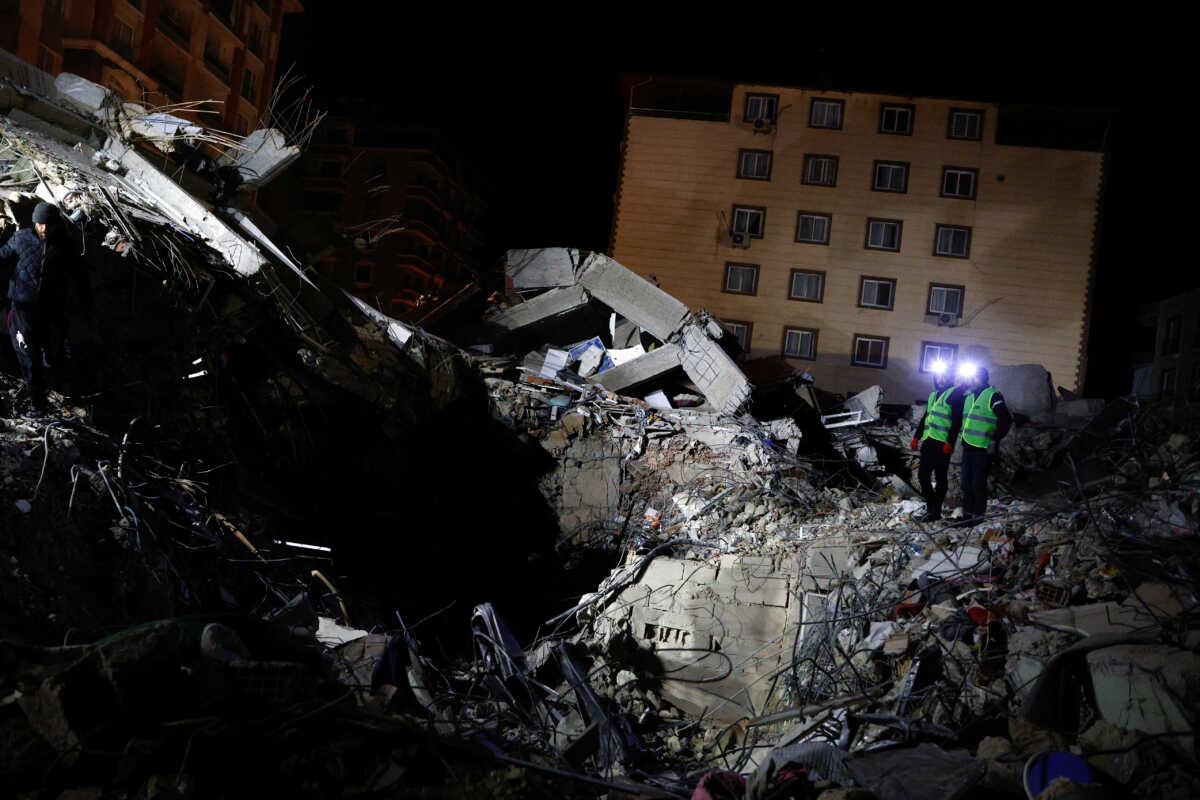 Rescuers search for survivors in the aftermath of a deadly earthquake in Kirikhan, Turkey February 9, 2023. REUTERS