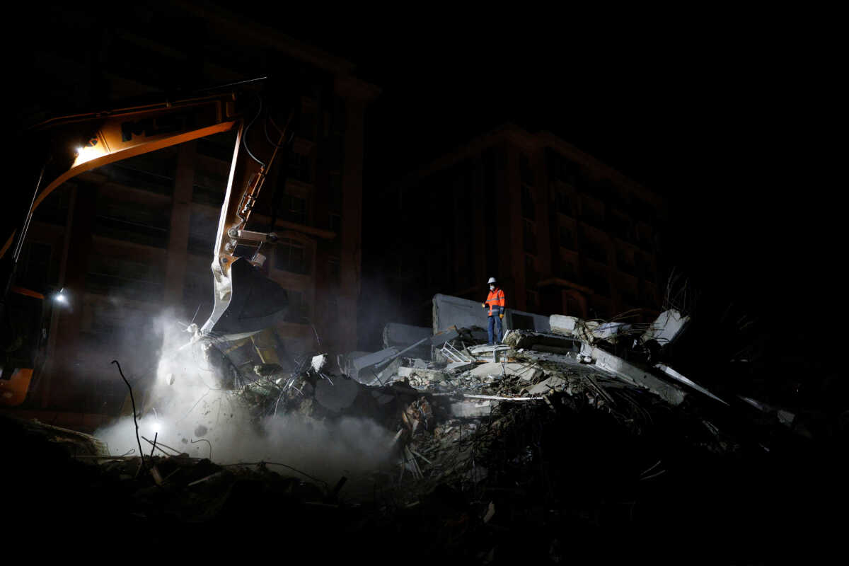 Rescuers work as they search for survivors in the aftermath of a deadly earthquake in Kirikhan, Turkey February 9, 2023. REUTERS