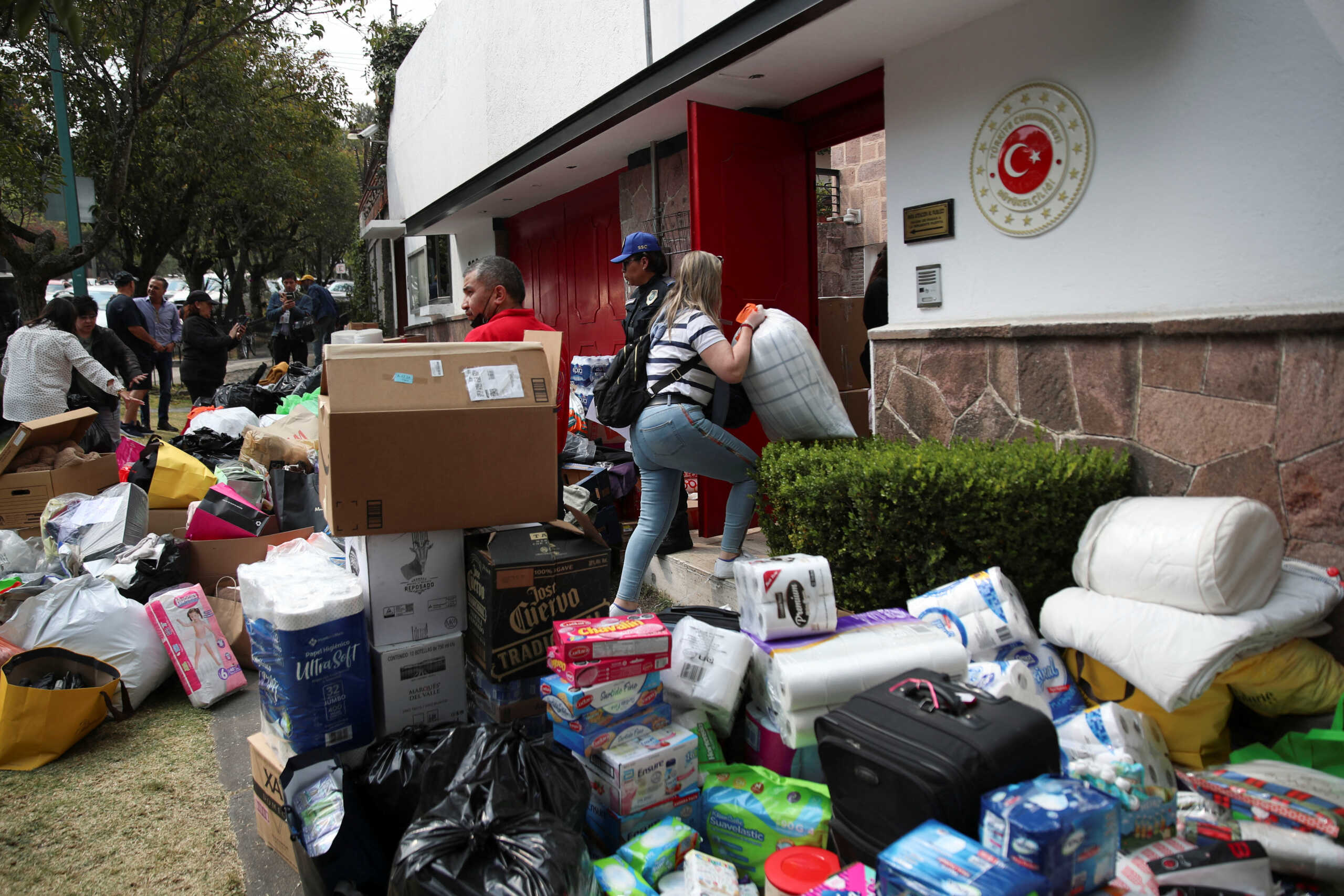 People donate various basic necessities, such as food, blankets and medical supplies, at a collection outside the Turkey's Embassy in Mexico City, in the aftermath of an earthquake in Turkey, in Mexico February 8, 2023. REUTERS
