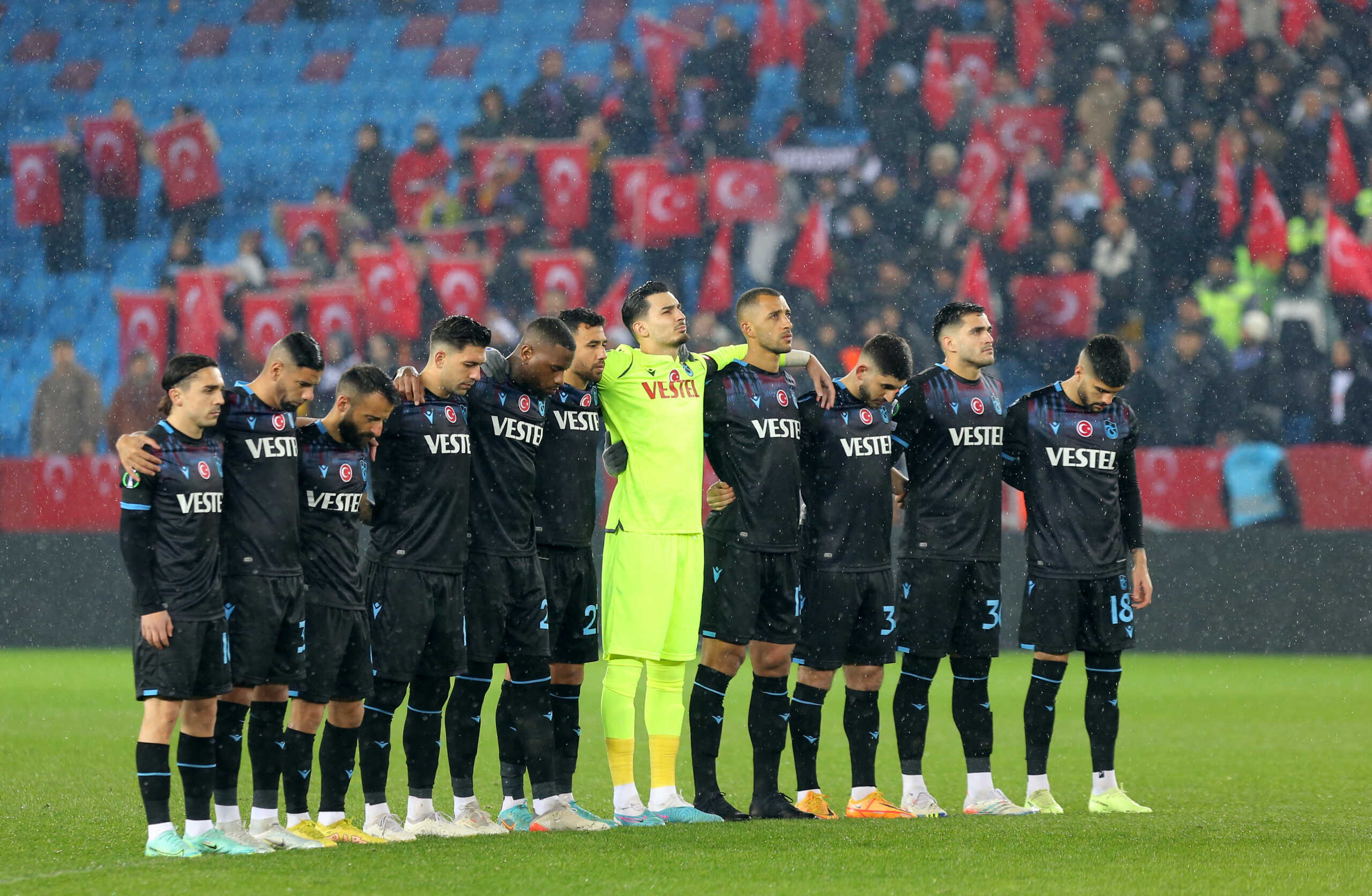 Soccer Football - Europa Conference League - Play-Off First Leg - Trabzonspor v Basel - Senol Gunes Spor Kompleksi Akyazi Stadyumu, Trabzon, Turkey - February 16, 2023  Trabzonspor players during a minutes silence for the victims of an earthquake in Turkey and Syria before the match REUTERS