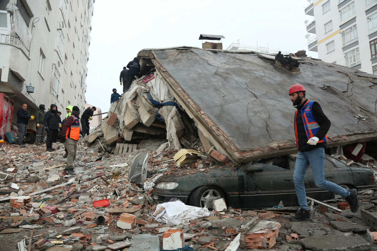 Rescuers search for survivors under the rubble following an earthquake in Diyarbakir, Turkey February 6, 2023. REUTERS