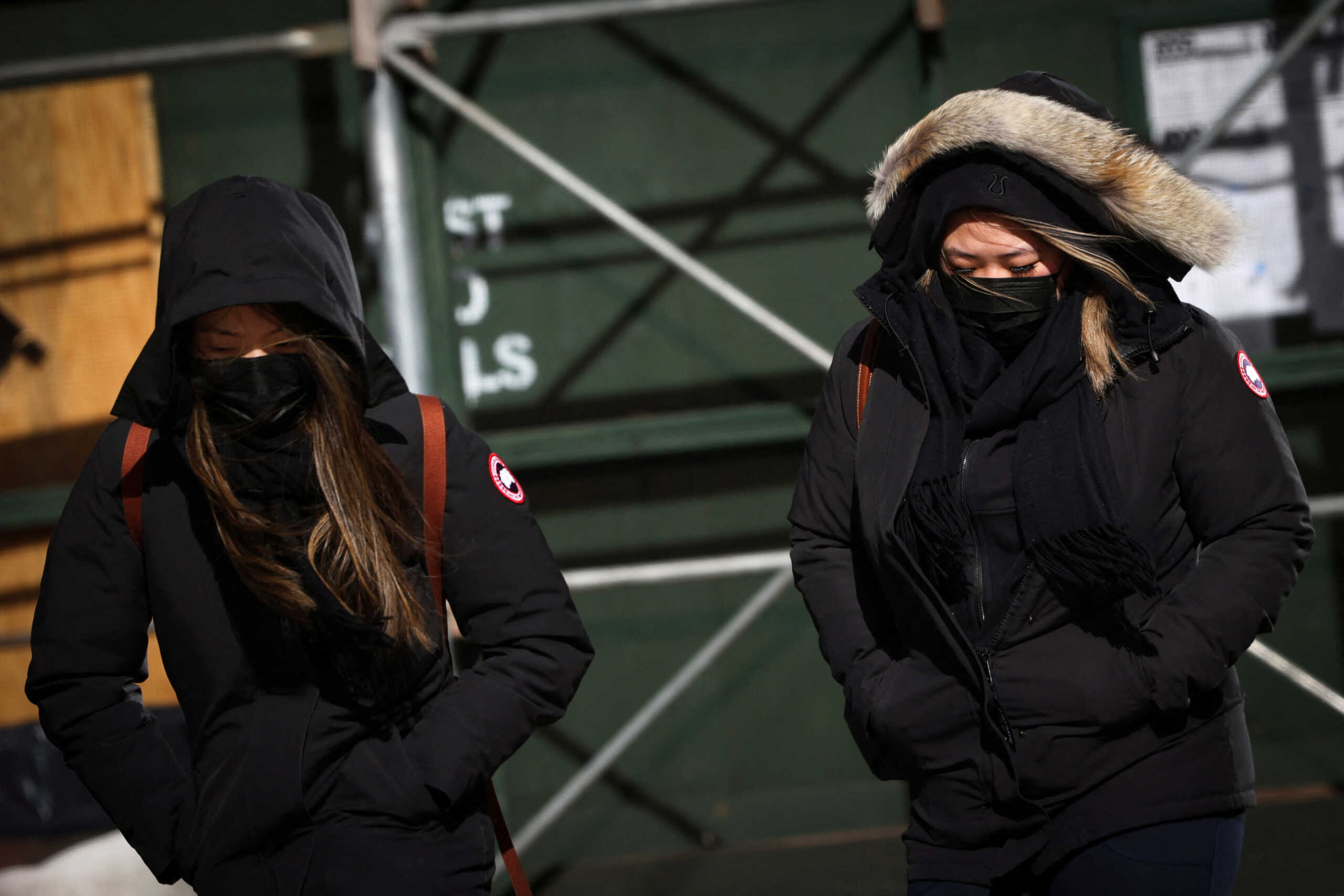 Women walk in bitter cold temperatures and high winds in Manhattan as deep cold spread across the northeast United States in New York City, New York, U.S., February 3, 2023. REUTERS