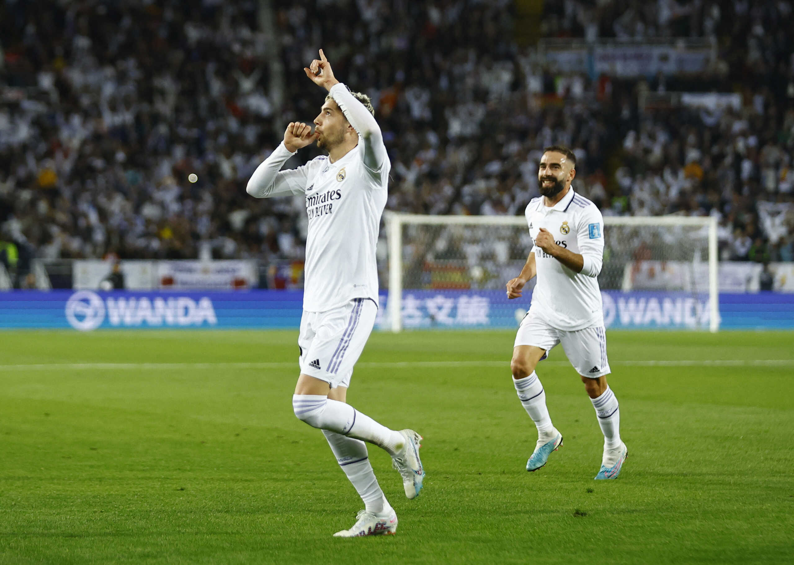 Soccer Football - FIFA Club World Cup - Final - Real Madrid v Al Hilal - Prince Moulay Abdellah Stadium, Rabat, Morocco - February 11, 2023 Real Madrid's Federico Valverde celebrates scoring their second goal with Dani Carvajal Action Images via Reuters