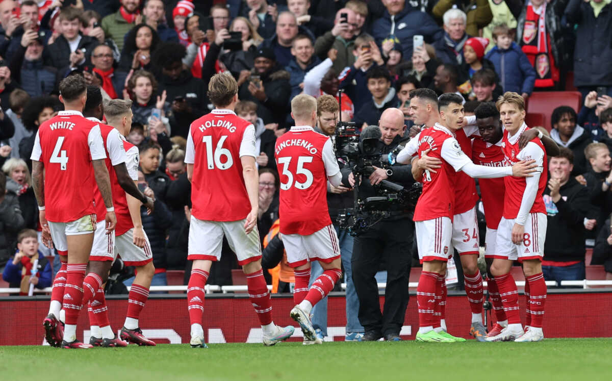 Soccer Football - Premier League - Arsenal v Crystal Palace - Emirates Stadium, London, Britain - March 19, 2023 Arsenal's Bukayo Saka celebrates scoring their second goal with teammates REUTERS