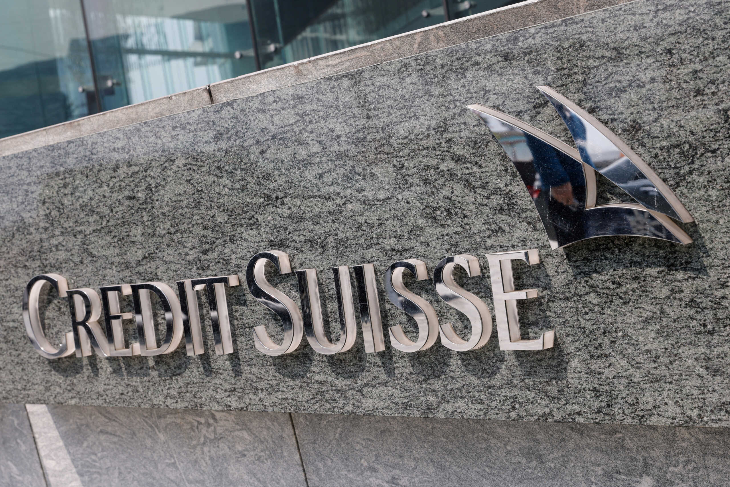 The logo of Credit Suisse is seen outside its office building in Hong Kong, China, March 16, 2023. REUTERS