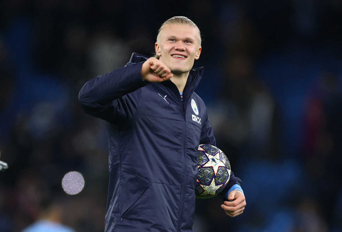 Soccer Football - Champions League - Round of 16 - Second Leg - Manchester City v RB Leipzig - Etihad Stadium, Manchester, Britain - March 14, 2023 Manchester City's Erling Braut Haaland celebrates as he carries the match ball after the match after scoring 5 goals REUTERS