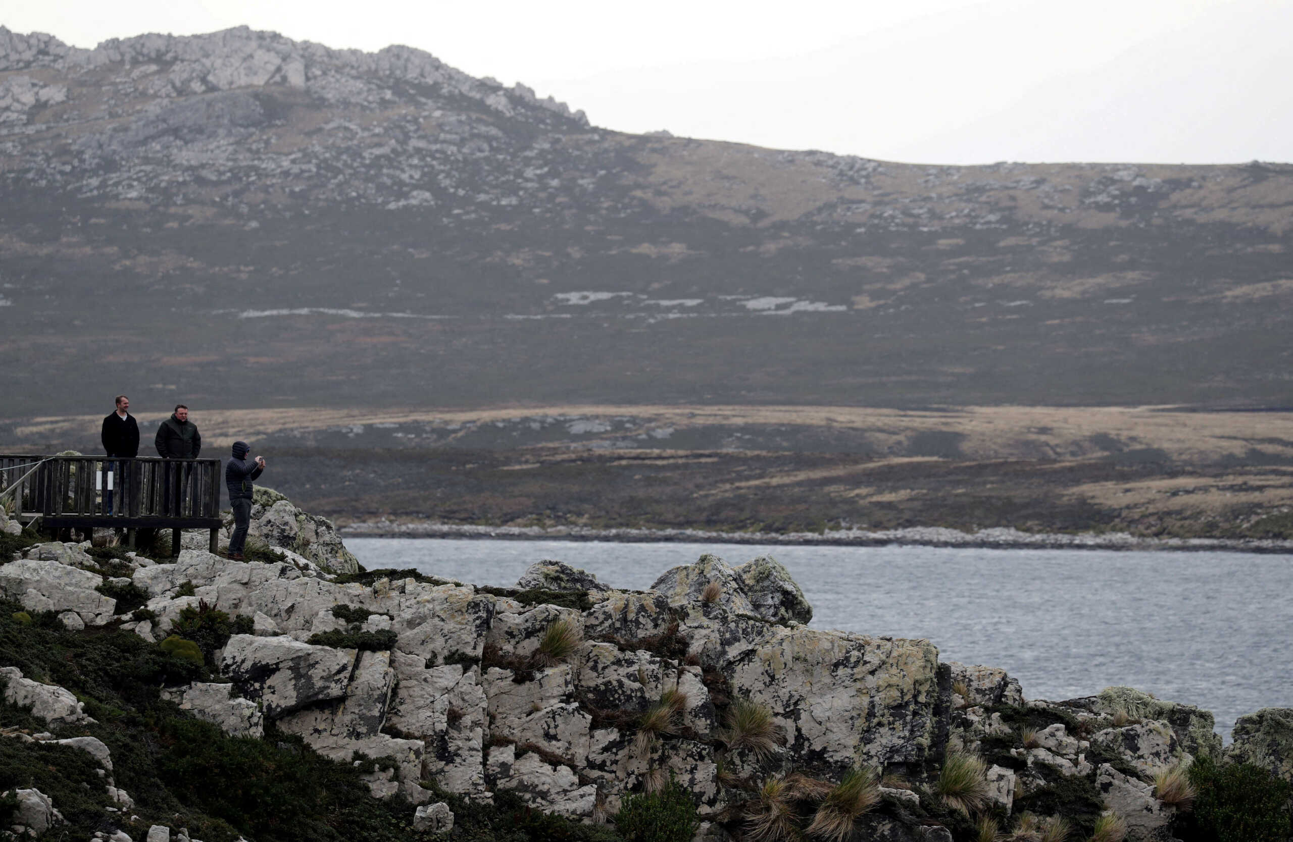 FILE PHOTO: People visit Gypsy Cove, near Port Stanley, Falkland Islands, May 17, 2018. REUTERS