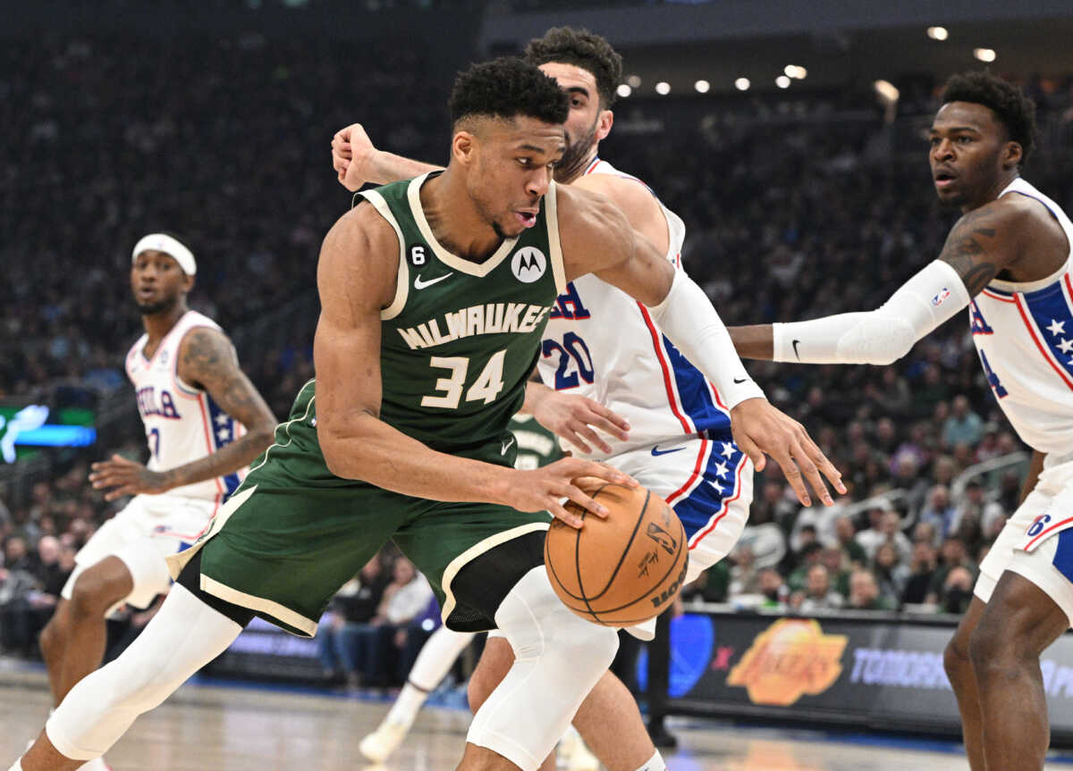 Mar 4, 2023; Milwaukee, Wisconsin, USA; Milwaukee Bucks forward Giannis Antetokounmpo (34) drives to the basket against Philadelphia 76ers forward Georges Niang (20) in the first half at Fiserv Forum. Mandatory Credit: Michael McLoone-USA TODAY Sports