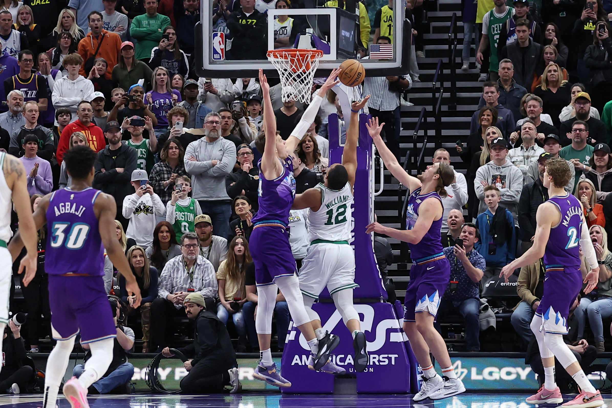 Mar 18, 2023; Salt Lake City, Utah, USA; Utah Jazz center Walker Kessler (24) blocks the shot of Boston Celtics forward Grant Williams (12) with 4 seconds to go in the game at Vivint Arena. Mandatory Credit: Rob Gray-USA TODAY Sports