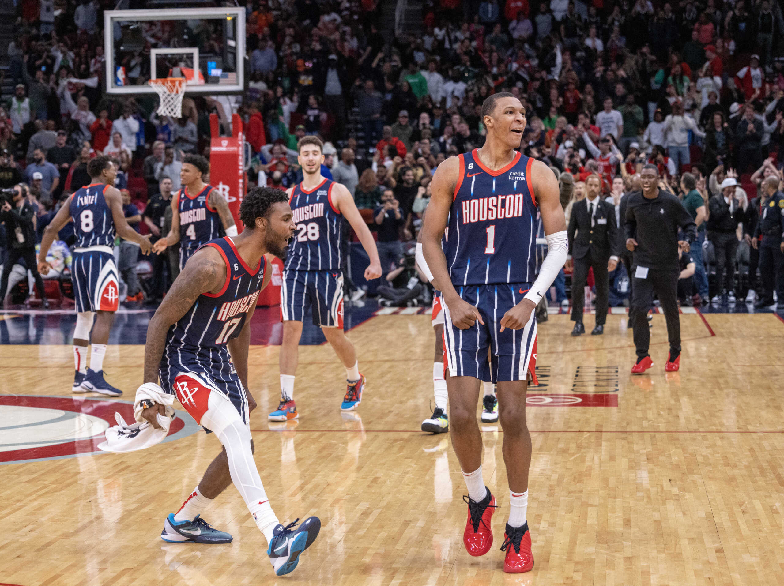 Mar 17, 2023; Houston, Texas, USA; Houston Rockets guard Jalen Green (4) celebrates with forward Jabari Smith Jr. (1)  after his game-winning three point basket against the New Orleans Pelicans in the fourth quarter at Toyota Center. Mandatory Credit: Thomas Shea-USA TODAY Sports