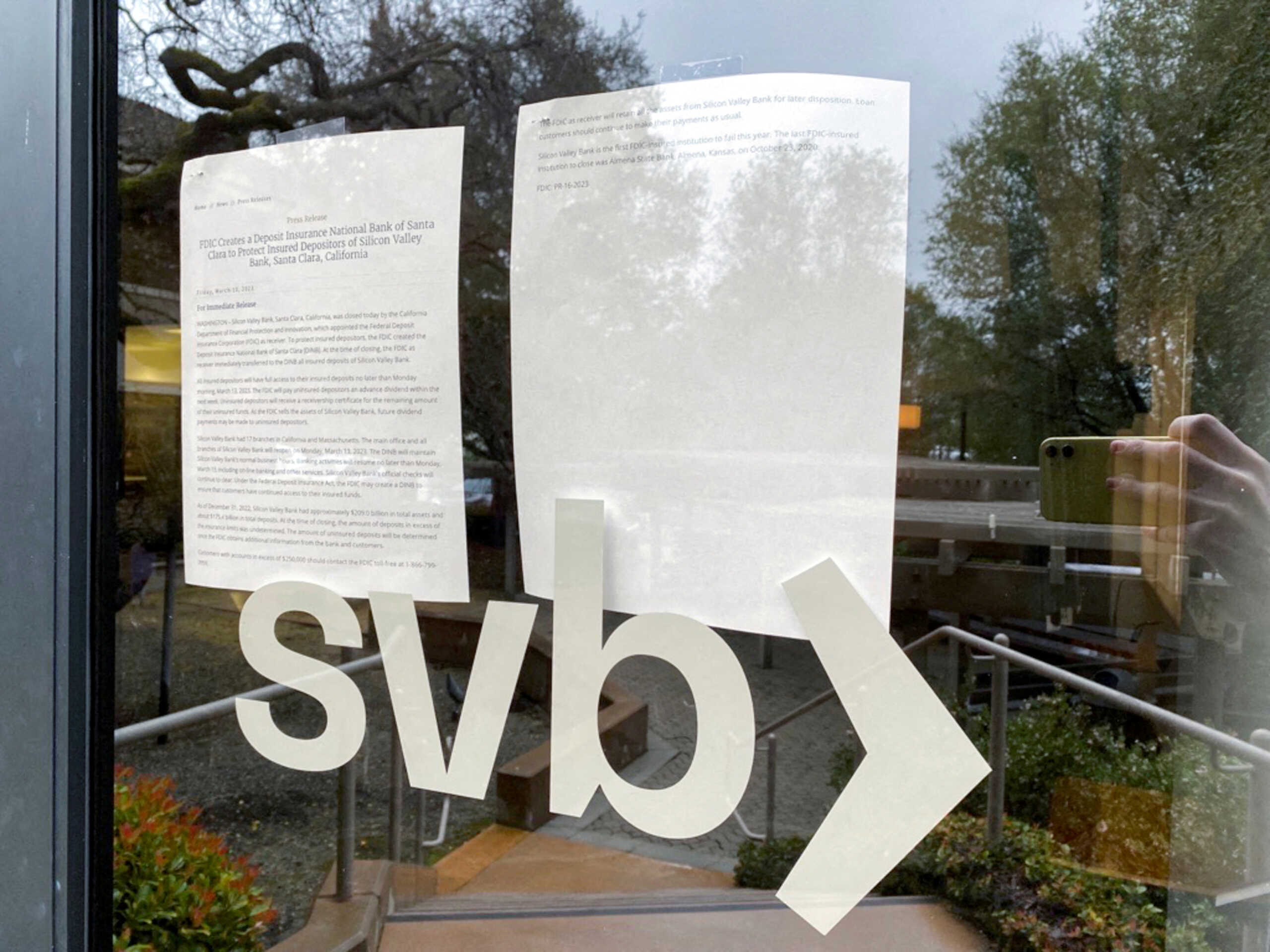 FILE PHOTO: A locked door to a Silicon Valley Bank (SVB) location on Sand Hill Road is seen in Menlo Park, California, U.S. March 10, 2023. REUTERS