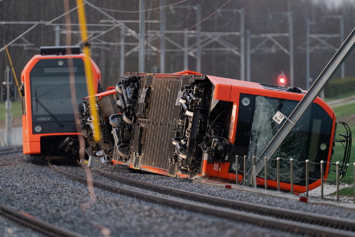 epa10552778 A general view of the site of a derailed train of the company Aare Seeland mobil, in Luescherz, Switzerland, 31 March 2023.  EPA