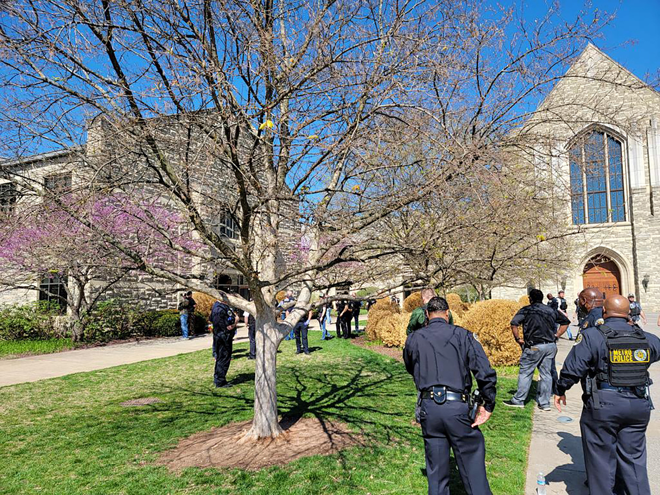 Police officers arrive at the Covenant School, Covenant Presbyterian Church, after reports of a shooting in Nashville, Tennessee, U.S. March 27, 2023.  Metropolitan Nashville Police Department