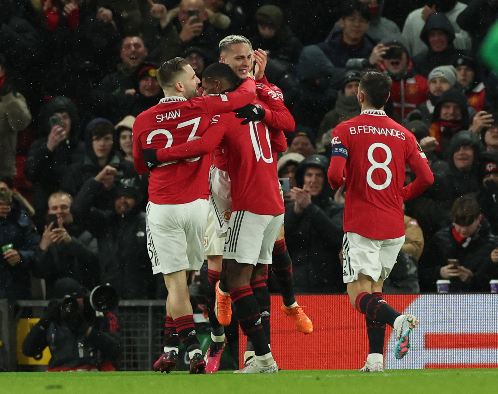 Soccer Football - Europa League - Round of 16 - First Leg - Manchester United v Real Betis - Old Trafford, Manchester, Britain - March 9, 2023 Manchester United's Antony celebrates scoring their second goal with teammates REUTERS