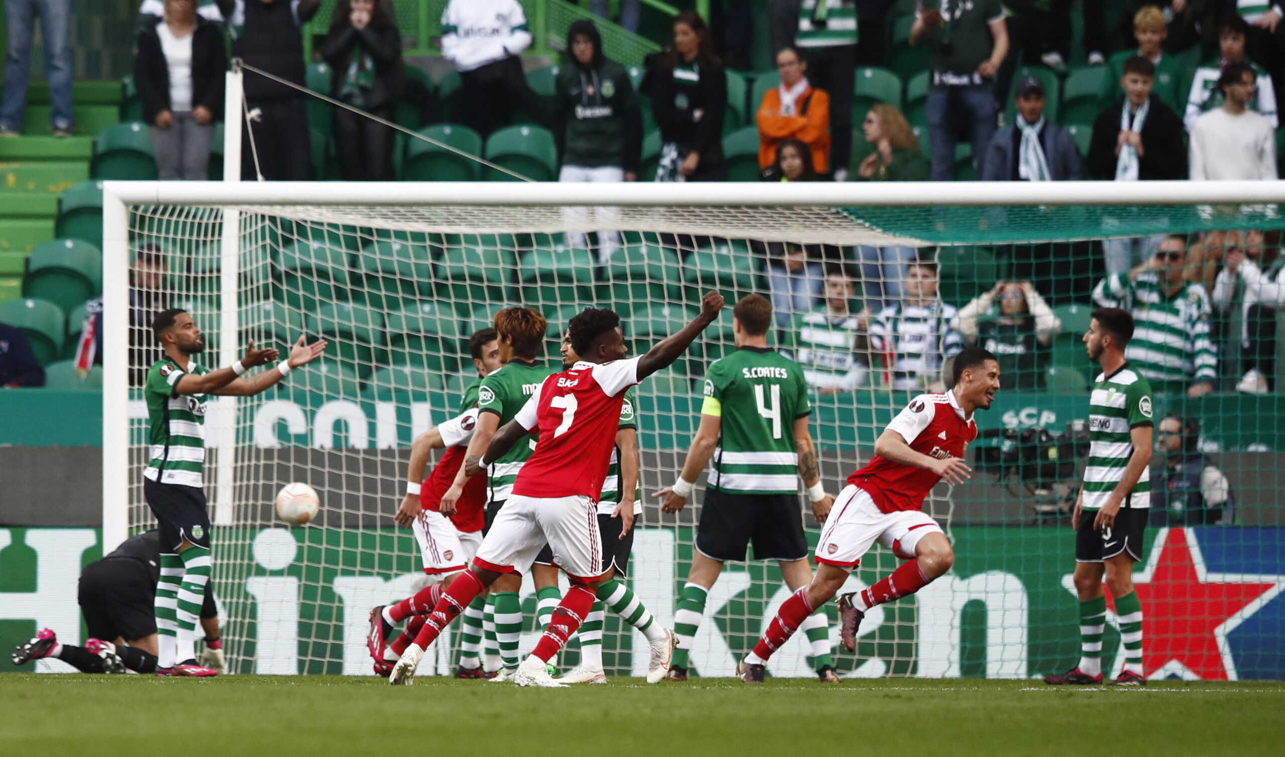 Soccer Football - Europa League - Round of 16 - First Leg - Sporting CP v Arsenal - Estadio Jose Alvalade, Lisbon, Portugal - March 9, 2023  Arsenal's William Saliba celebrates scoring their first goal with Bukayo Saka REUTERS