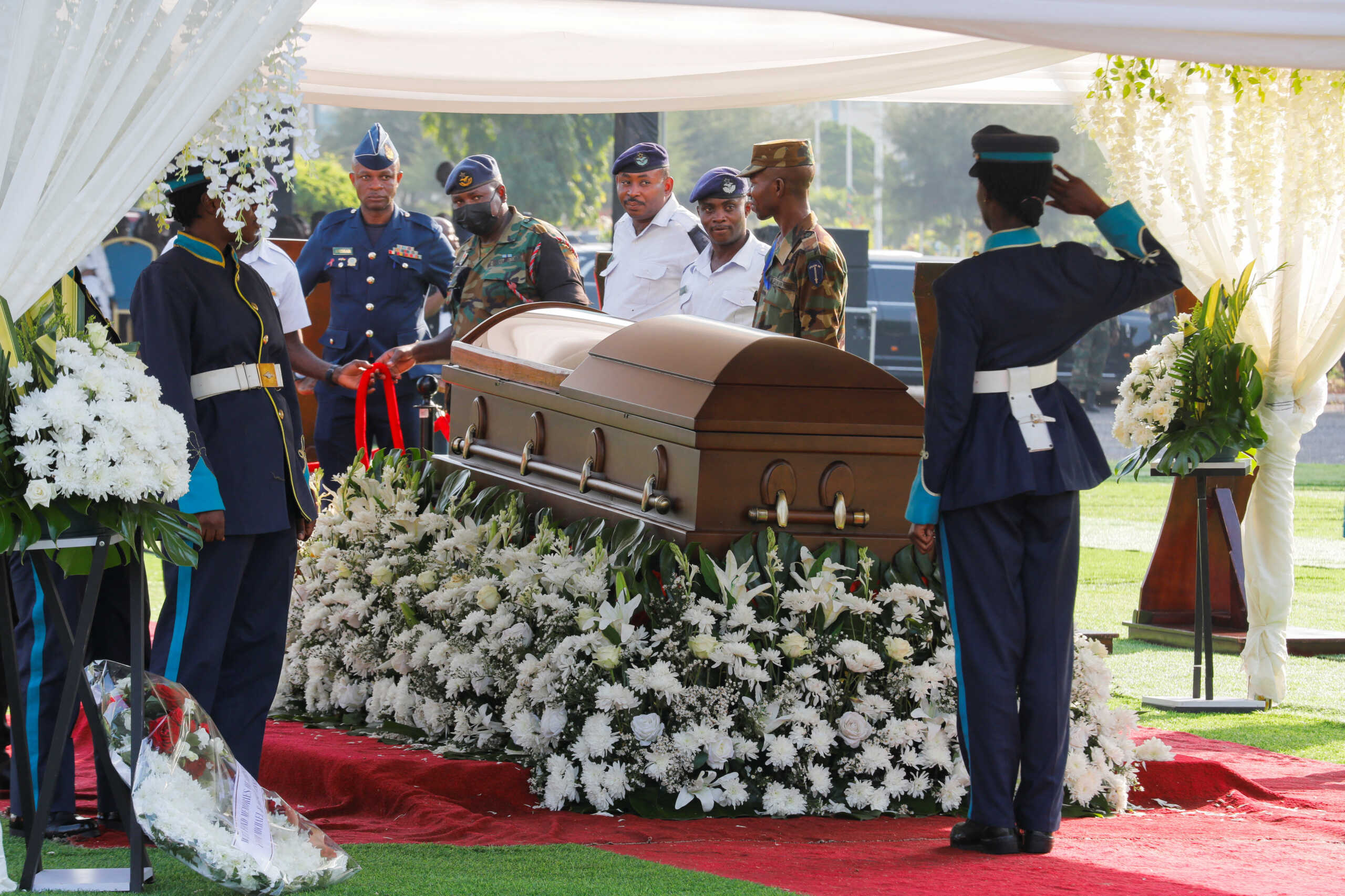 Pallbearer gestures by the coffin of the late Ghanaian footballer Christian Atsu Twasam, 31-year-old, during a state-assisted funeral in Accra, Ghana. March 17, 2023. REUTERS