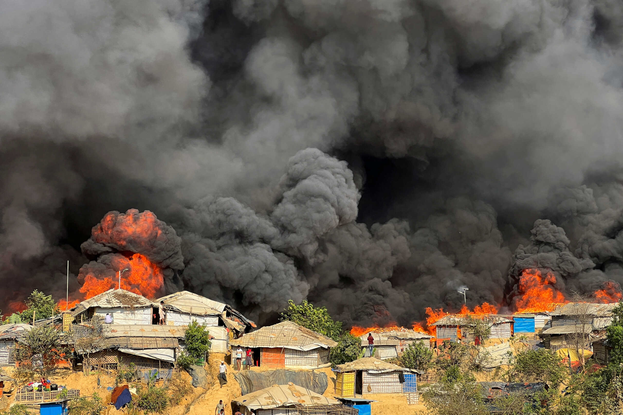 Fire burns in the Rohingya refugee camp in Balukhali in Cox's Bazar, Bangladesh, March 5, 2023. REUTERS