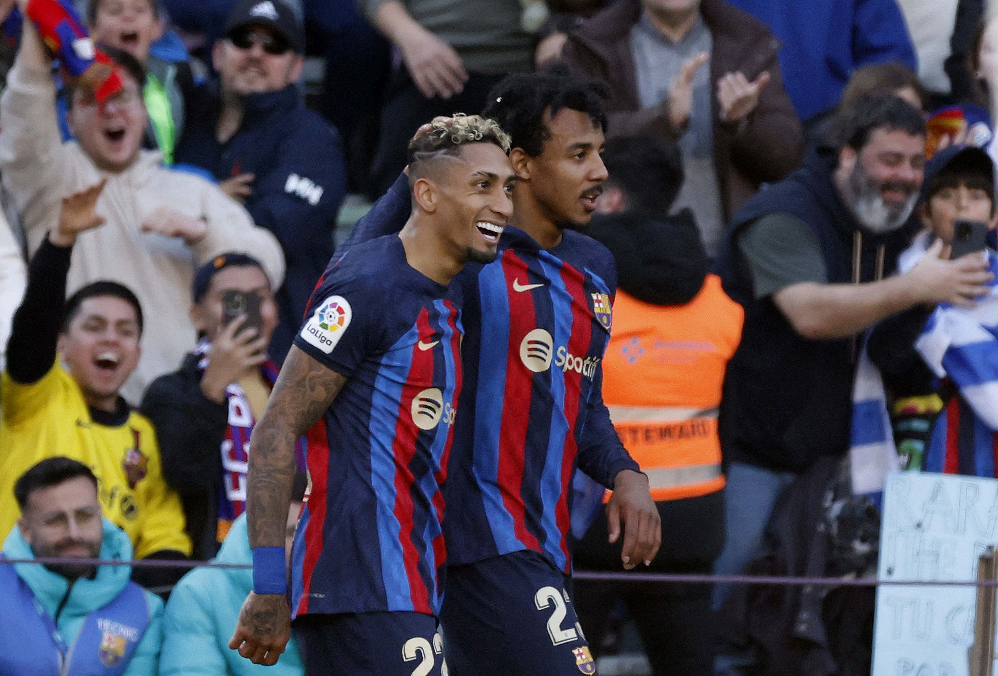 Soccer Football - LaLiga - FC Barcelona v Valencia - Camp Nou, Barcelona, Spain - March 5, 2023 FC Barcelona's Raphinha celebrates scoring their first goal with Jules Kounde REUTERS