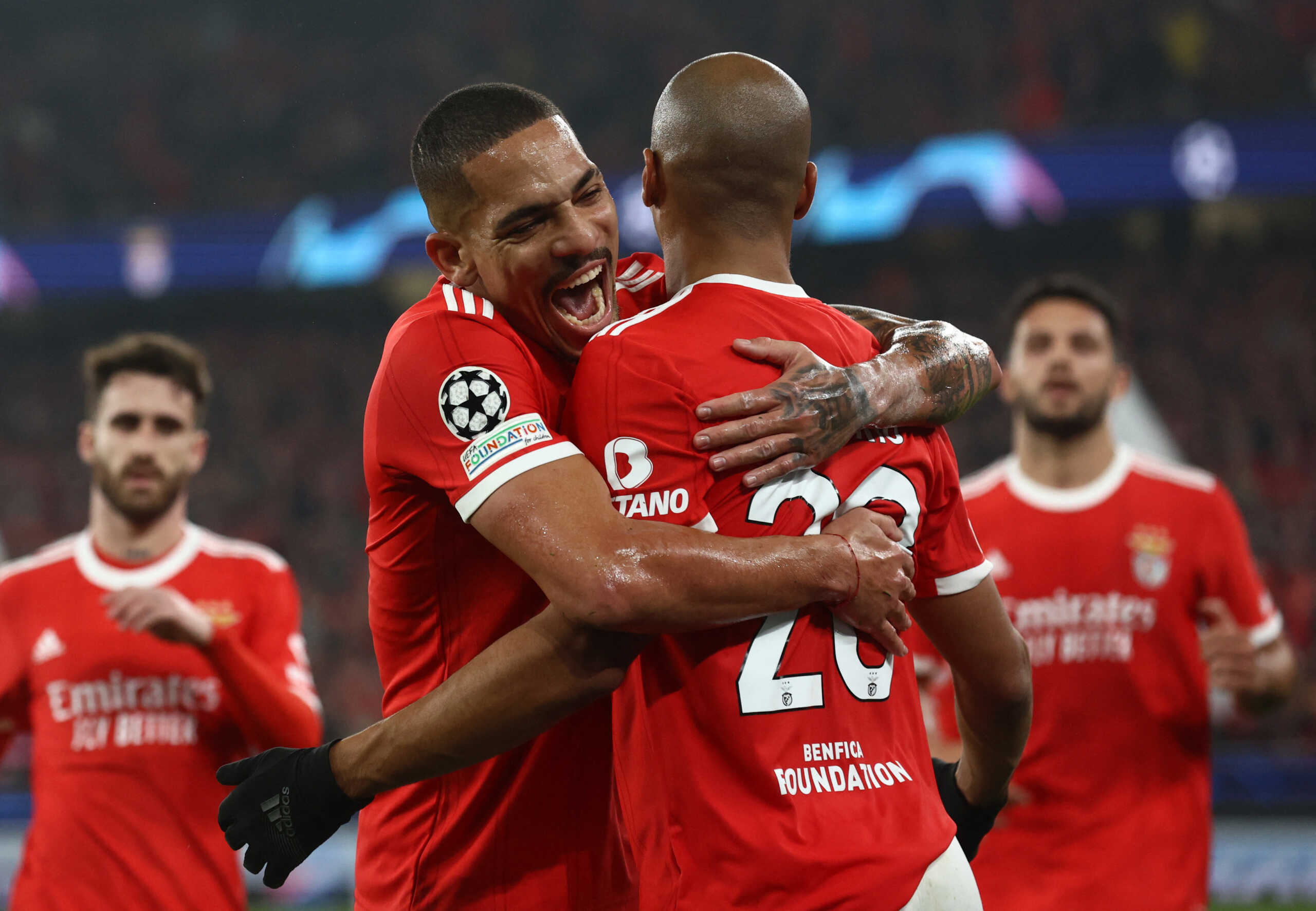 Soccer Football - Champions League - Round of 16 - Second Leg - Benfica v Club Brugge - Estadio da Luz, Lisbon, Portugal - March 7, 2023 Benfica's Joao Mario celebrates scoring their fourth goal with teammate Gilberto REUTERS