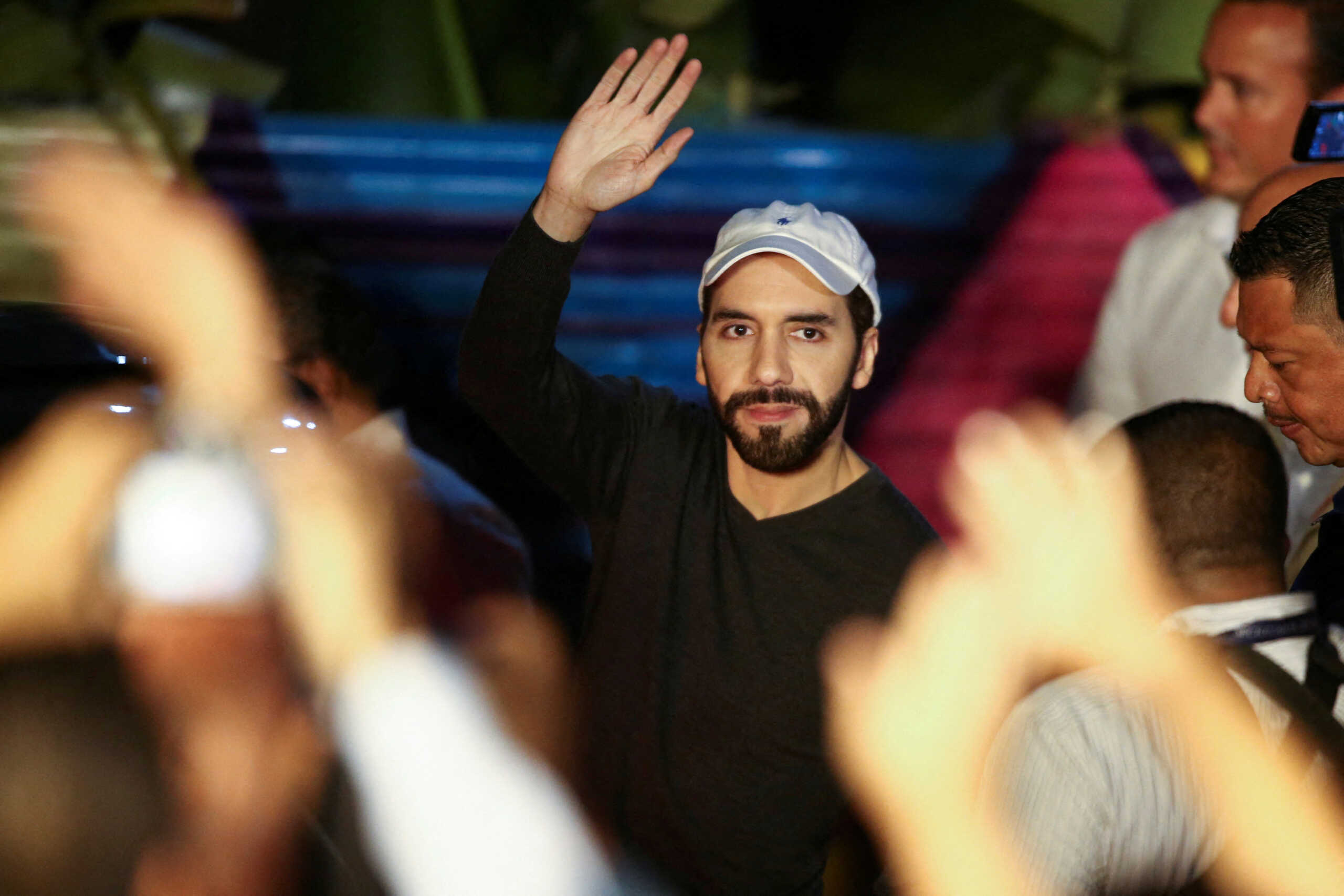 FILE PHOTO: El Salvador's President Nayib Bukele waves as he leaves after an inauguration ceremony of a youth community center, in Mejicanos, El Salvador January 17, 2023. REUTERS