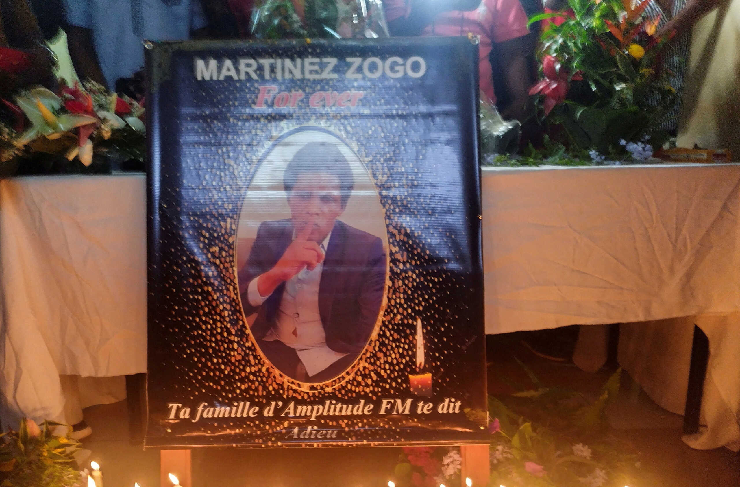 FILE PHOTO: Cameroon journalist Martinez Zogo's photo is displayed as fellow journalists pay their last respect to him after he was found dead after abduction, in Yaounde, Cameroon January 23, 2023. REUTERS