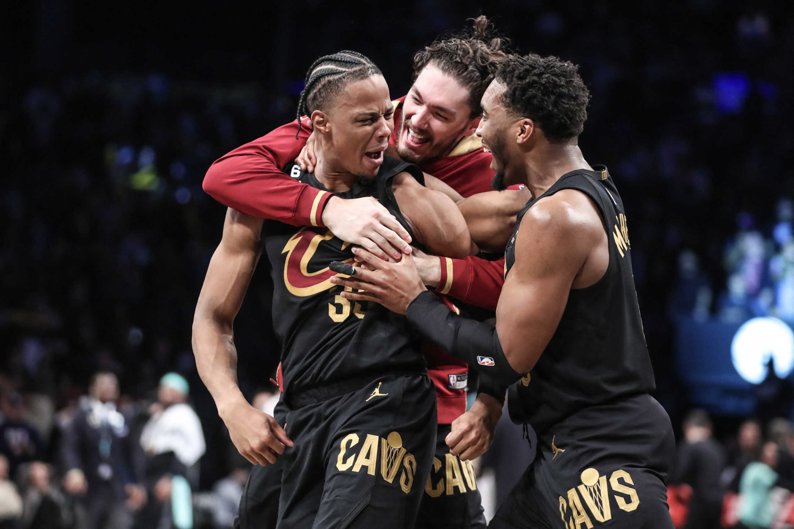 Mar 23, 2023; Brooklyn, New York, USA;  Cleveland Cavaliers forward Isaac Okoro (35) celebrates with his teammates after scoring the game wining basket to beat the Brooklyn Nets 116-114 at Barclays Center. Mandatory Credit: Wendell Cruz-USA TODAY Sports