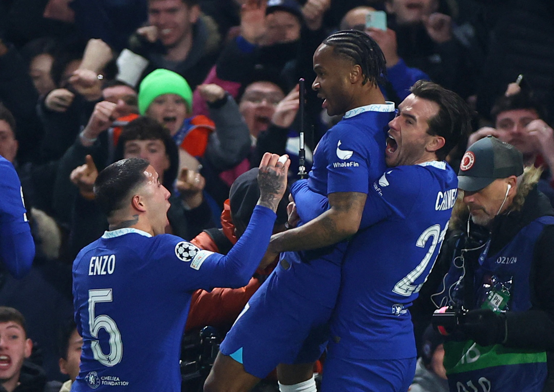 Soccer Football - Champions League - Round of 16 - Second Leg - Chelsea v Borussia Dortmund - Stamford Bridge, London, Britain - March 7, 2023 Chelsea's Raheem Sterling celebrates scoring their first goal with Enzo Fernandez and Ben Chilwell REUTERS