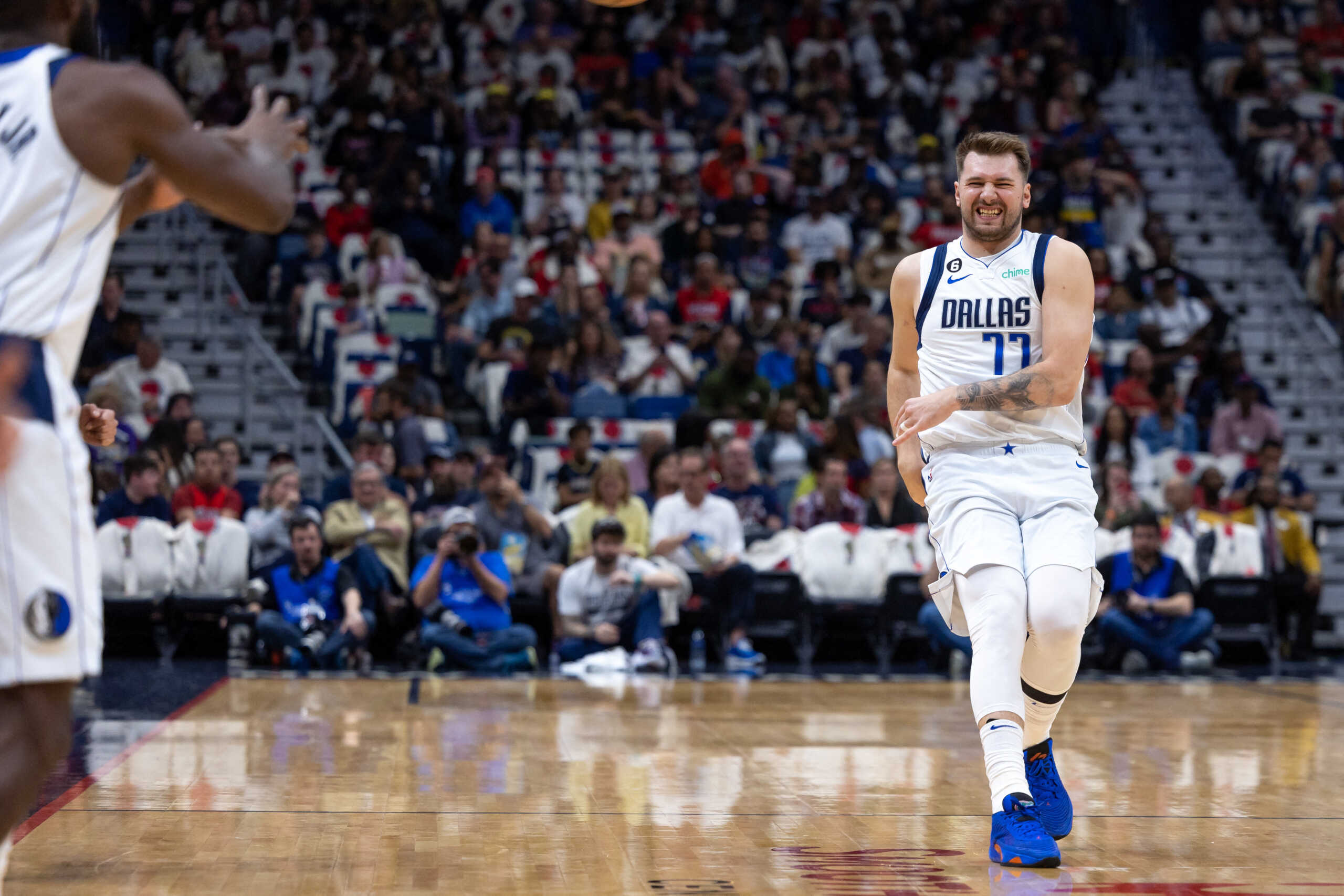 Mar 8, 2023; New Orleans, Louisiana, USA; Dallas Mavericks guard Luka Doncic (77) reacts as he passes the ball to forward Tim Hardaway Jr. (11) against the New Orleans Pelicans during the first half at Smoothie King Center. Mandatory Credit: Stephen Lew-USA TODAY Sports