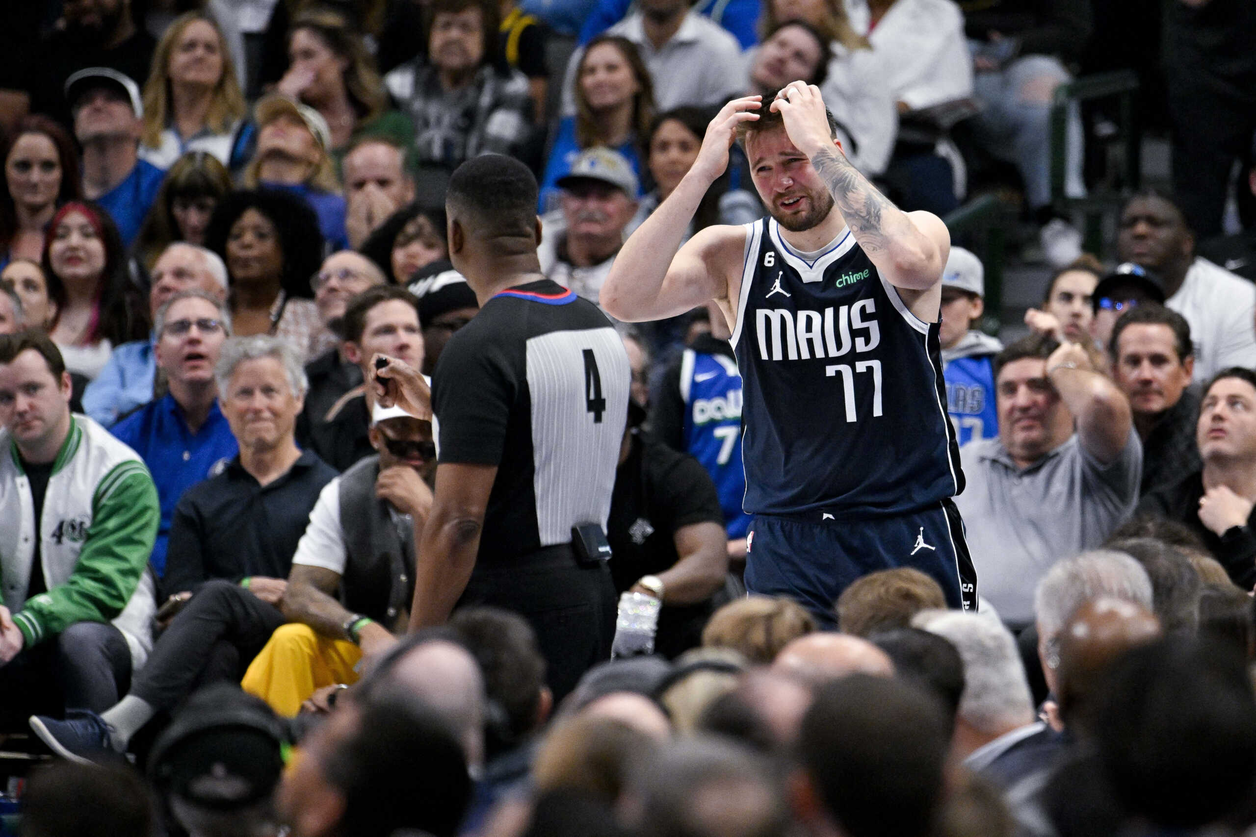 Mar 22, 2023; Dallas, Texas, USA; Dallas Mavericks guard Luka Doncic (77) reacts to a foul call during the second half against the Golden State Warriors at the American Airlines Center. Mandatory Credit: Jerome Miron-USA TODAY Sports