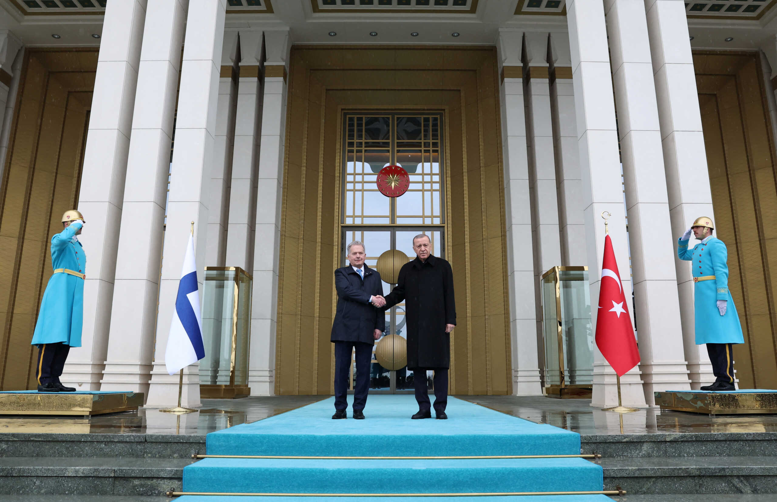 Turkey's President Tayyip Erdogan and Finland’s President Sauli Niinisto shake hands during a welcoming ceremony in Ankara, Turkey March 17, 2023. Murat Cetinmuhurdar