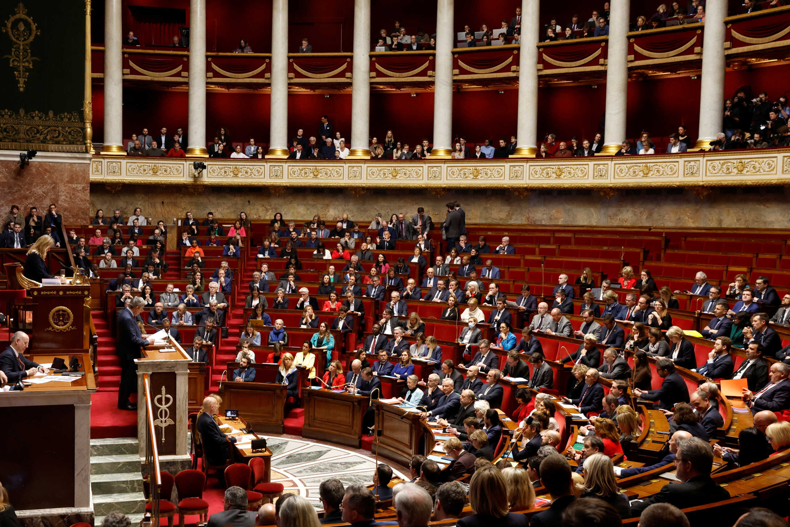 Member of parliament Charles de Courson of centrist group Liot delivers a speech during a debate on two motions of no-confidence against the French government, tabled by centrist group Liot and far-right Rassemblement National party, after the use by French government of the article 49.3, a special clause in the French Constitution, to push the pensions reform bill through the National Assembly without a vote by lawmakers, at the National Assembly in Paris, France, March 20, 2023. REUTERS