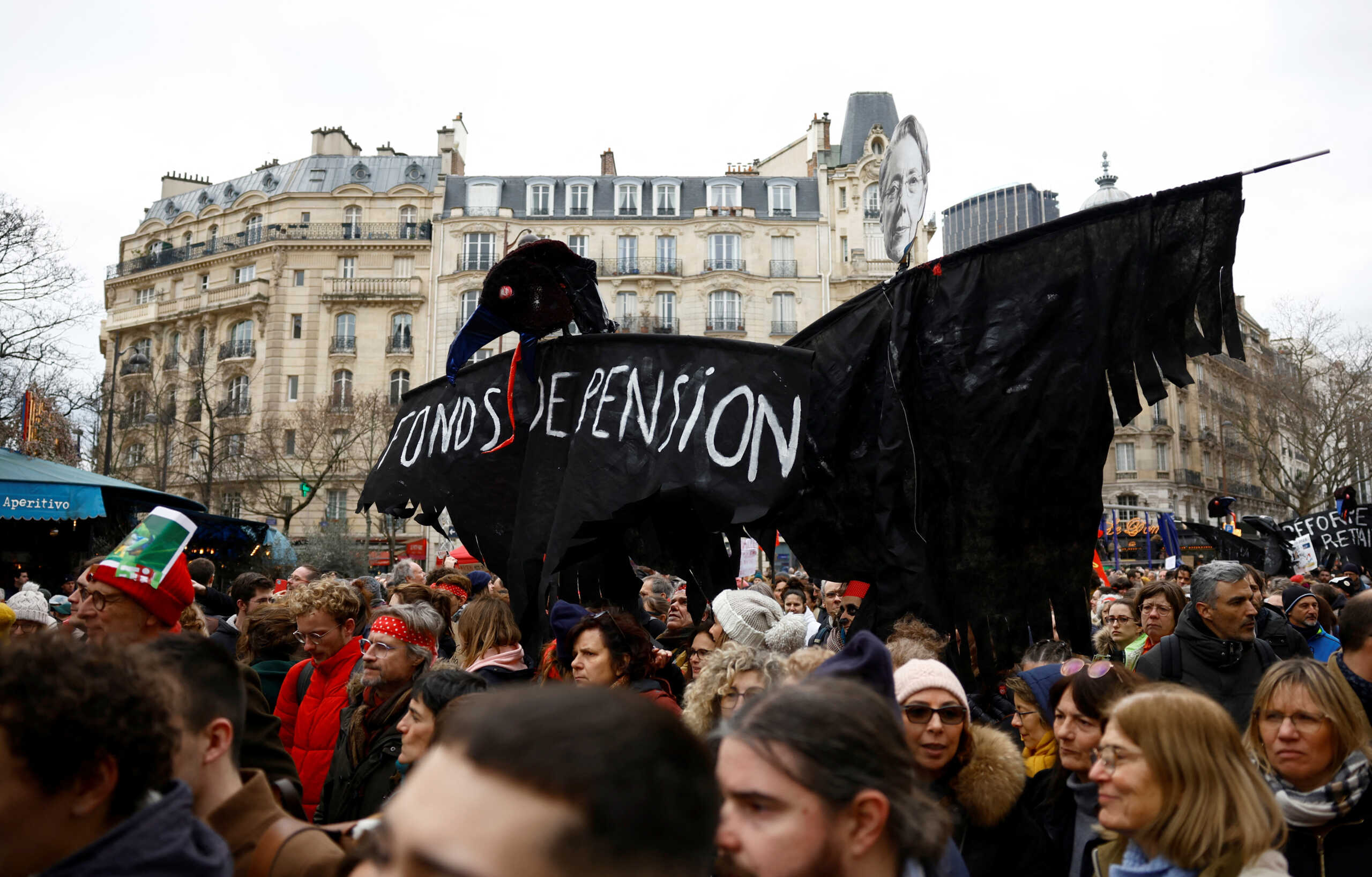Protesters attend a demonstration against French government's pension reform plan in Paris, as part of the sixth day of national strike and protests, in France, March 7, 2023. REUTERS