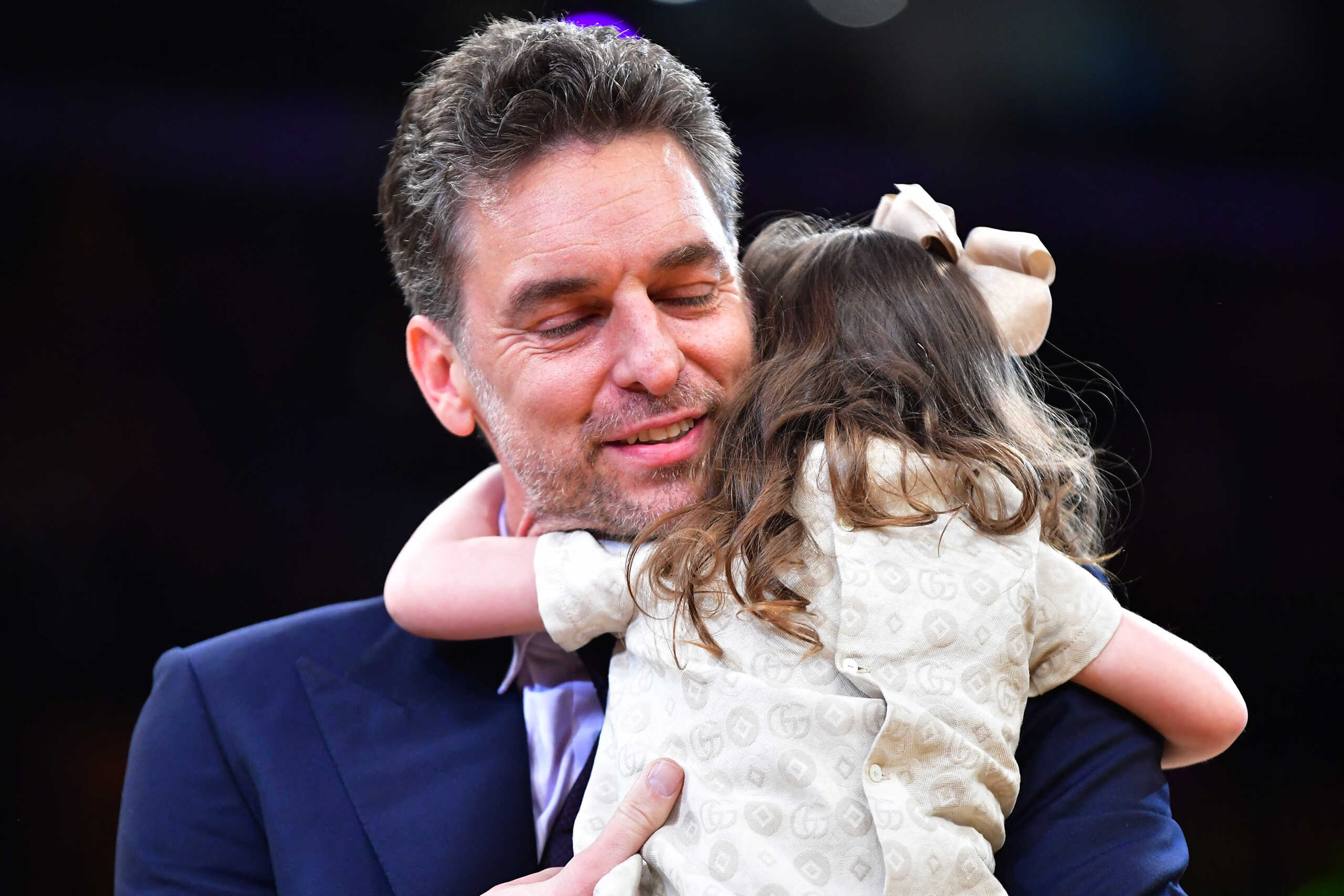 Mar 7, 2023; Los Angeles, California, USA; Los Angeles Lakers former player Pau Gasol hugs his daughter Elisabet Gianna during his jersey retirement at Crypto.com Arena. Mandatory Credit: Gary A. Vasquez-USA TODAY Sports