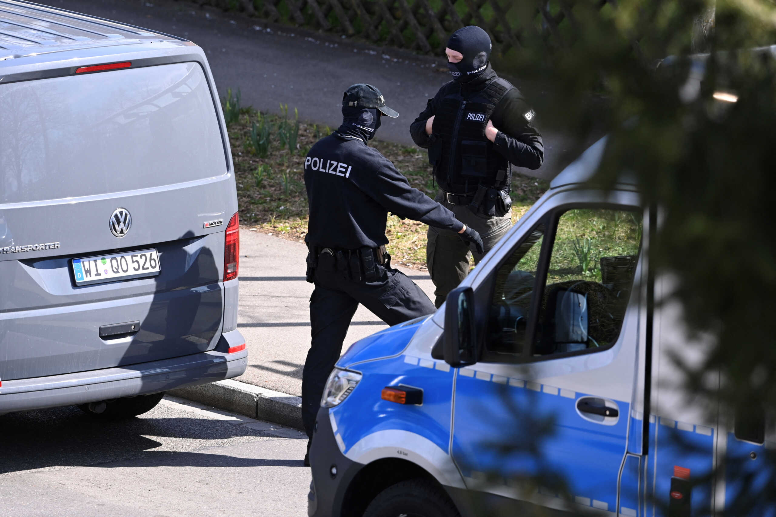 German special task force police officers are seen following a raid in the so-called Reichsbuerger scene, who do not recognize the legitimacy of modern Germany, insisting the far larger "Deutsche Reich" still exists, in Reutlingen, Germany March 22, 2023. One police officer was slightly injured and a suspect Reichsbuerger was arrested in Reutlingen during nation-wide raids in the extreme far-right movement. REUTERS