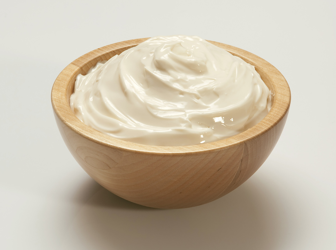 cream cheese in a wooden bowl