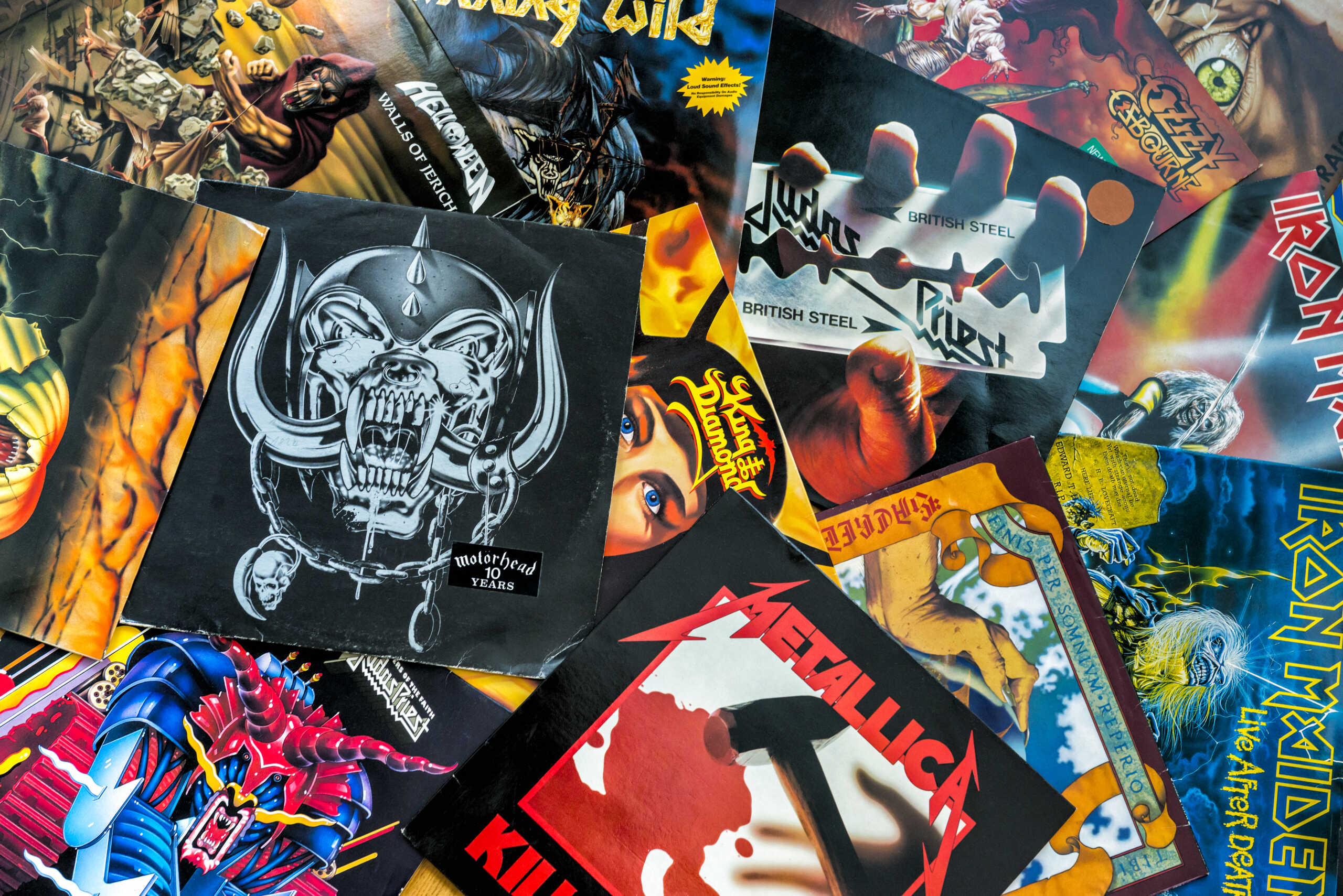 Gothenburg, Sweden - March 21, 2013: Vinyl record sleeves of different Heavy metal bands. All records are from the 1980's.