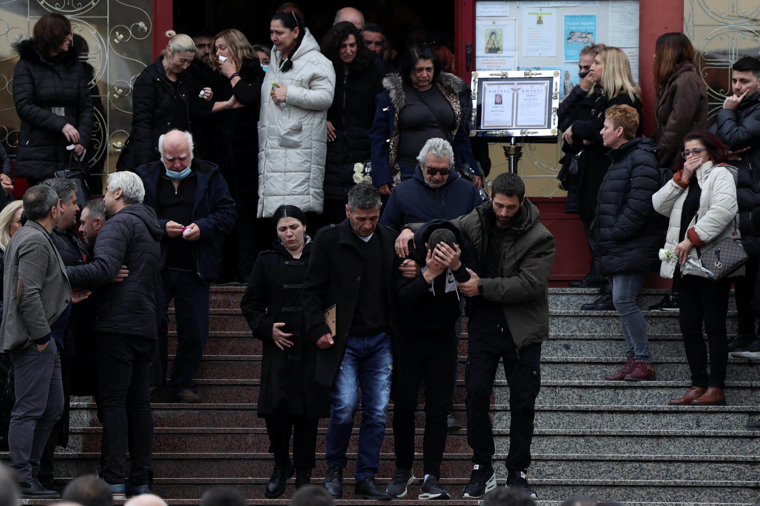 Relatives react during the funeral procession of a 34-year old woman, a passenger of a train that collided with another train near the city of Larissa, in Katerini, Greece, March 3, 2023. REUTERS