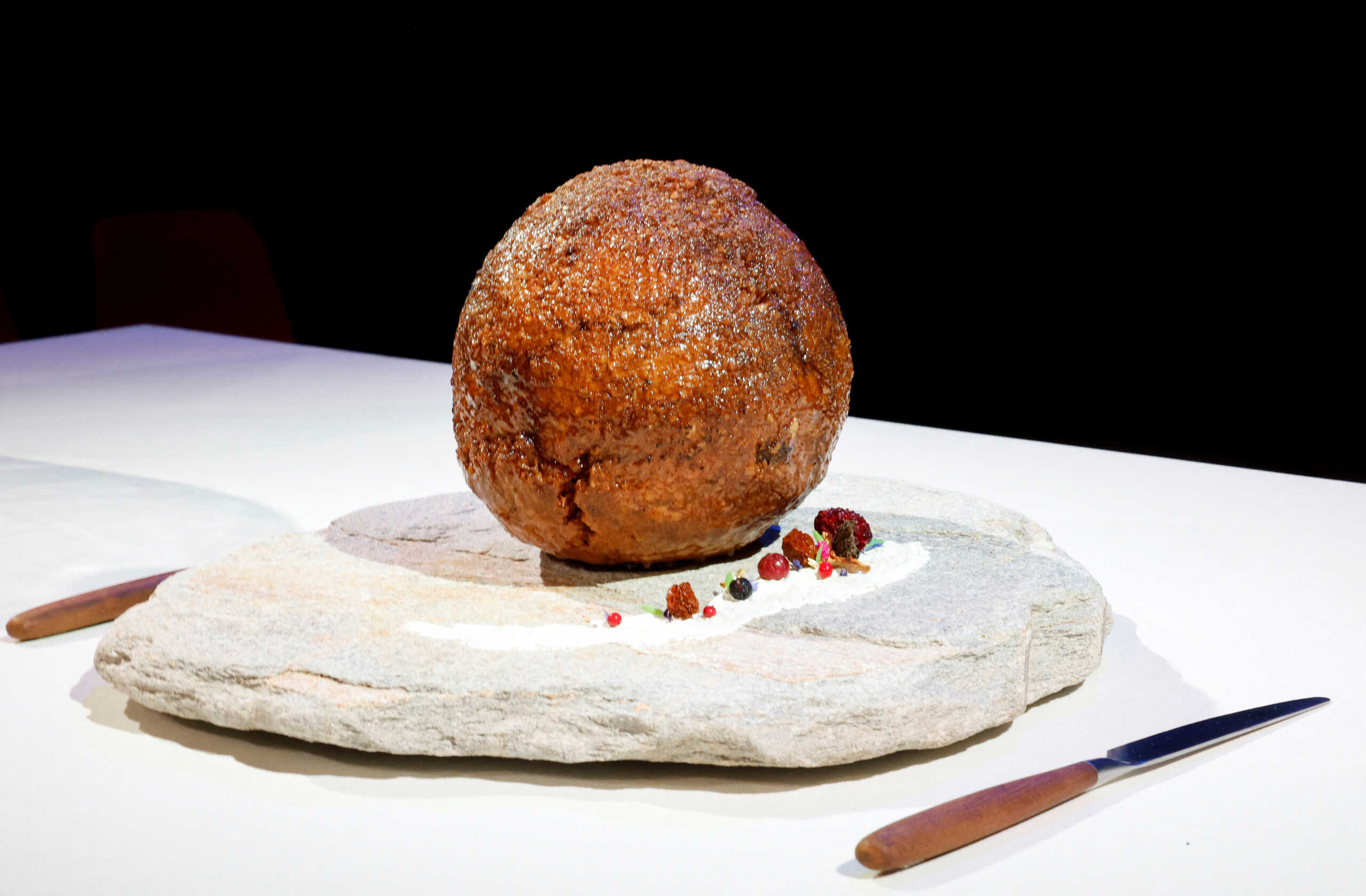 A meatball made from flesh cultivated using the DNA of an extinct woolly mammoth is presented at NEMO Science Museum created by a cultured meat company, in Amsterdam, Netherlands March 28, 2023. REUTERS