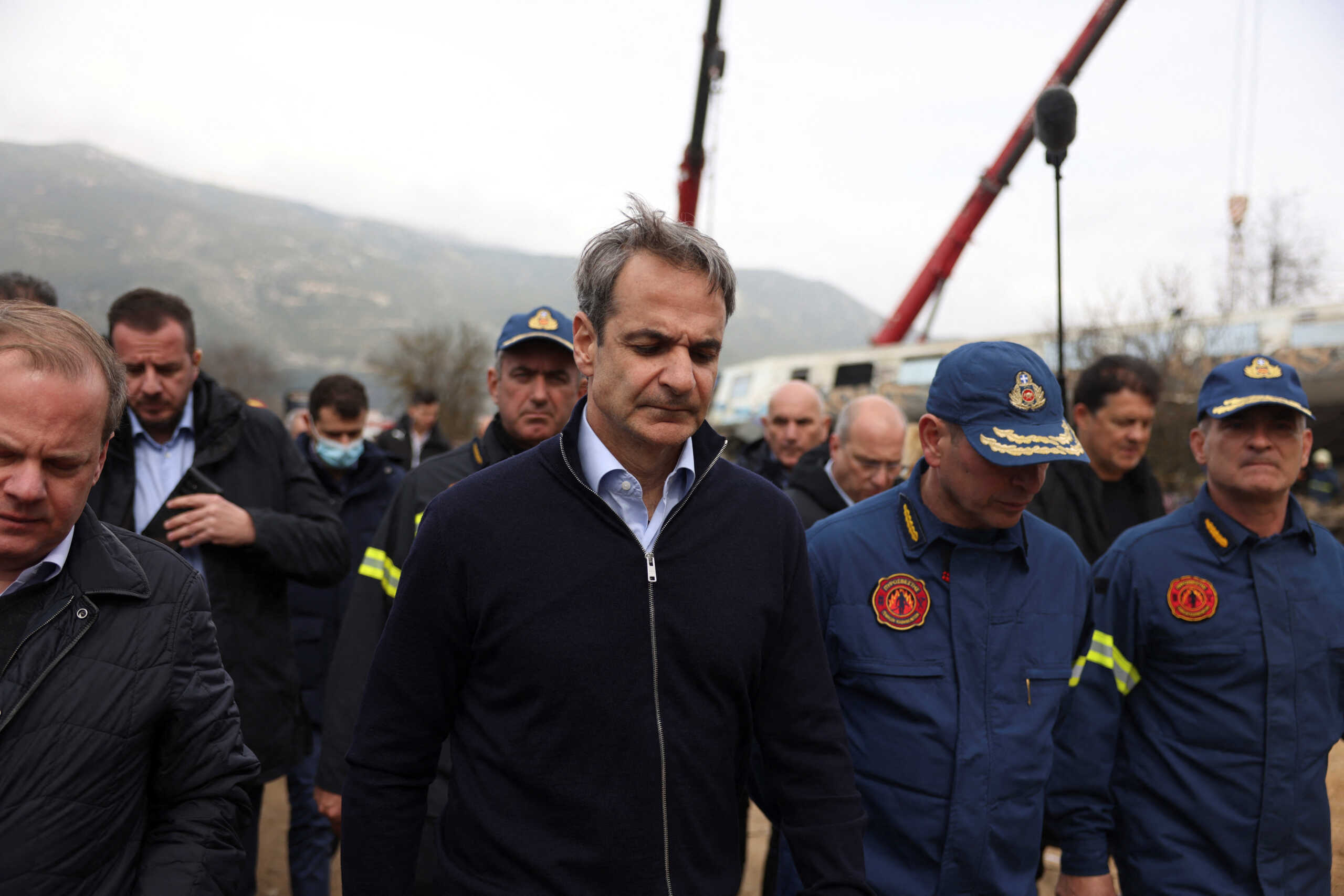 Greek Prime Minister Kyriakos Mitsotakis visits the site of a crash, where two trains collided, near the city of Larissa, Greece, March 1, 2023. REUTERS