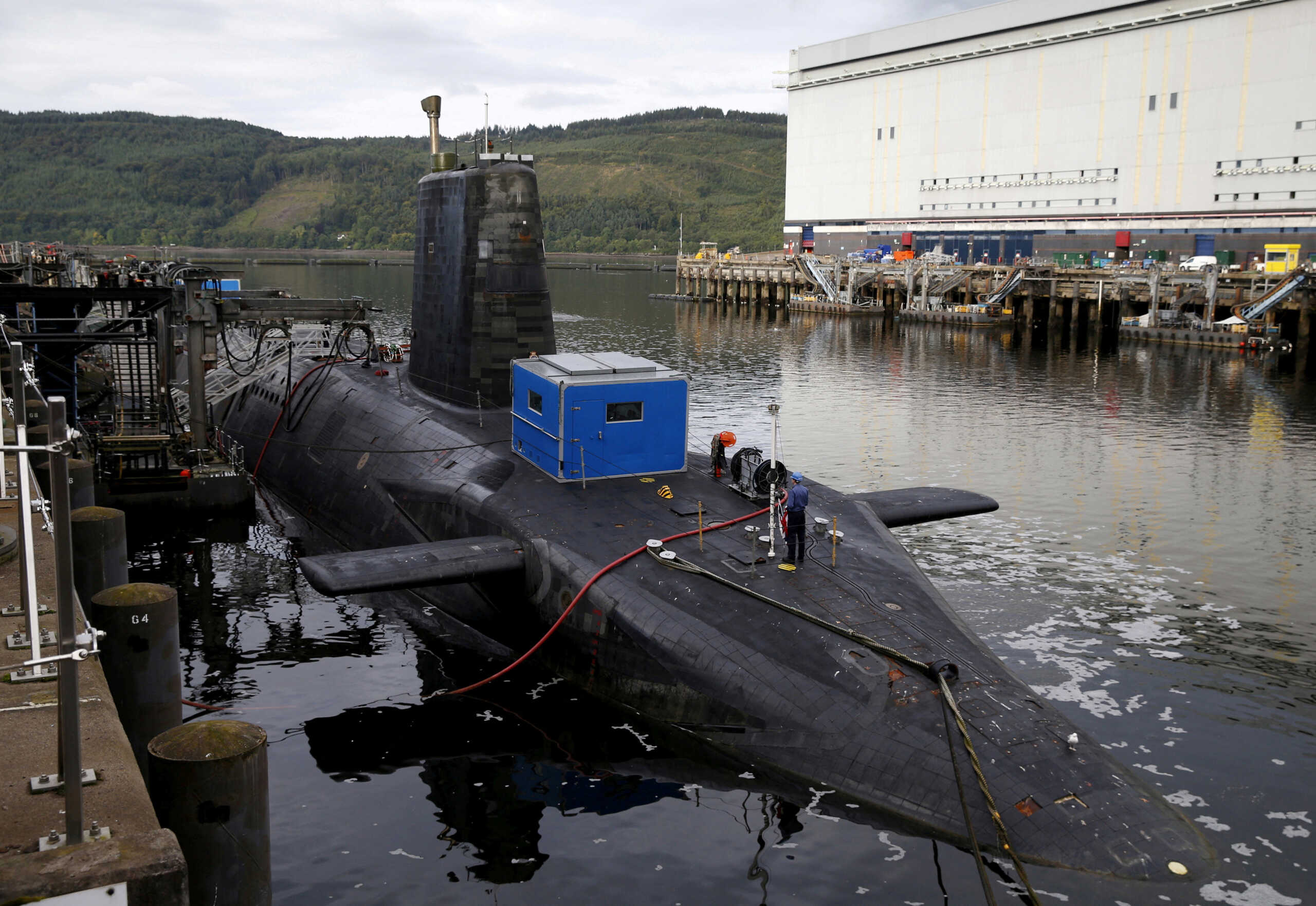 FILE PHOTO: A nuclear submarine is seen at the Royal Navy's submarine base at Faslane, Scotland, Britain August 31, 2015. REUTERS