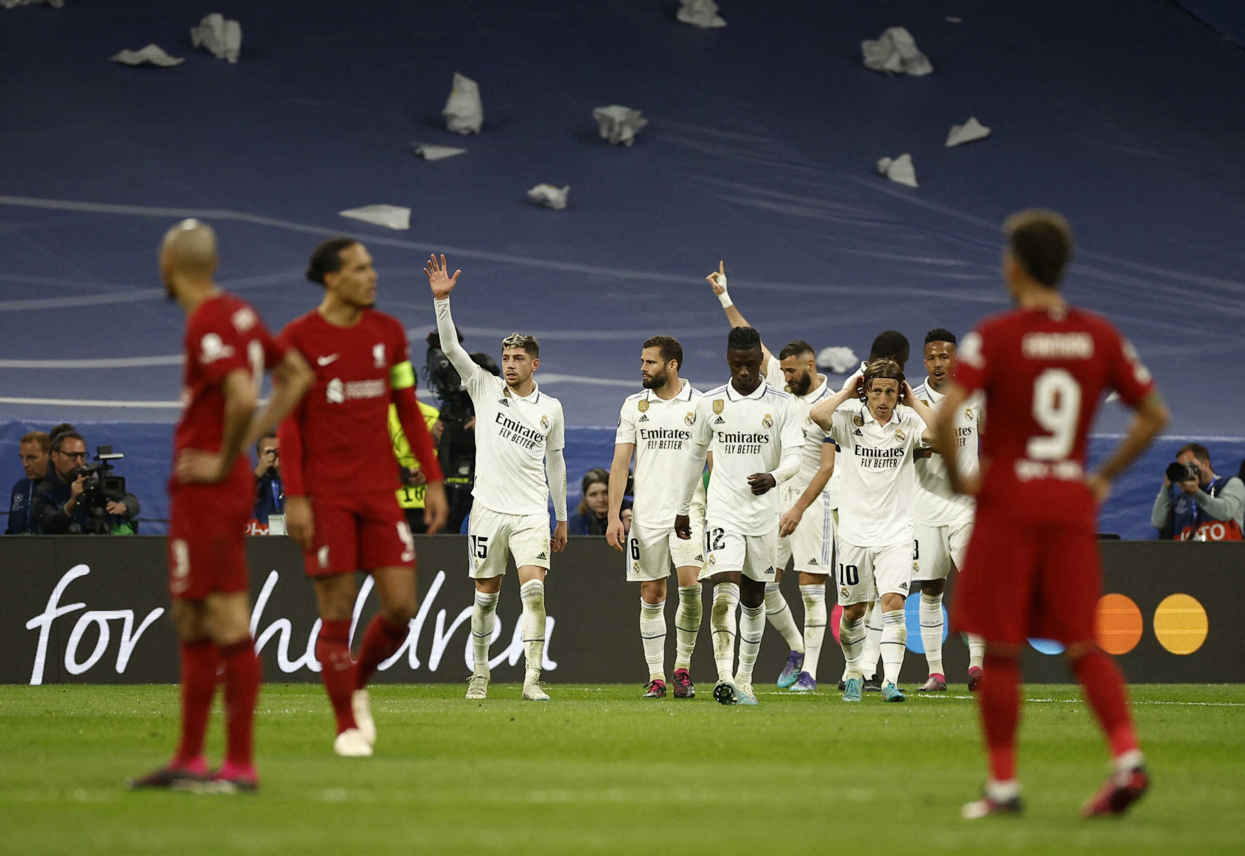 Soccer Football - Champions League - Round of 16 - Second Leg - Real Madrid v Liverpool - Santiago Bernabeu, Madrid, Spain - March 15, 2023 Real Madrid's Karim Benzema celebrates scoring their first goal with teammates REUTERS
