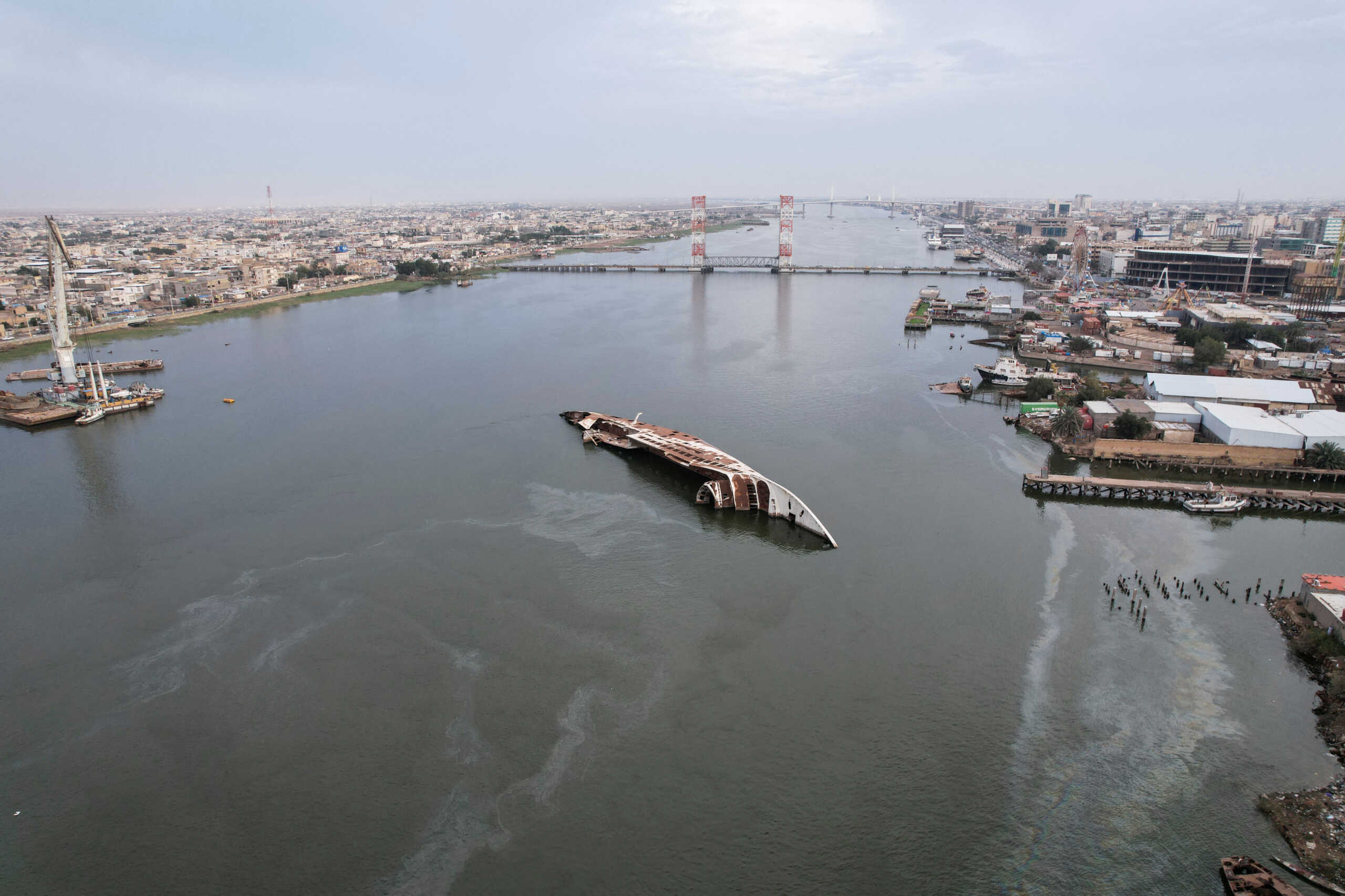 An aerial view of the 'Al-Mansur' yacht, once belonging to former Iraqi President Saddam Hussein, which has been lying on the water bed for years in the Shatt al-Arab waterway, in Basra, Iraq March 9, 2023.REUTERS