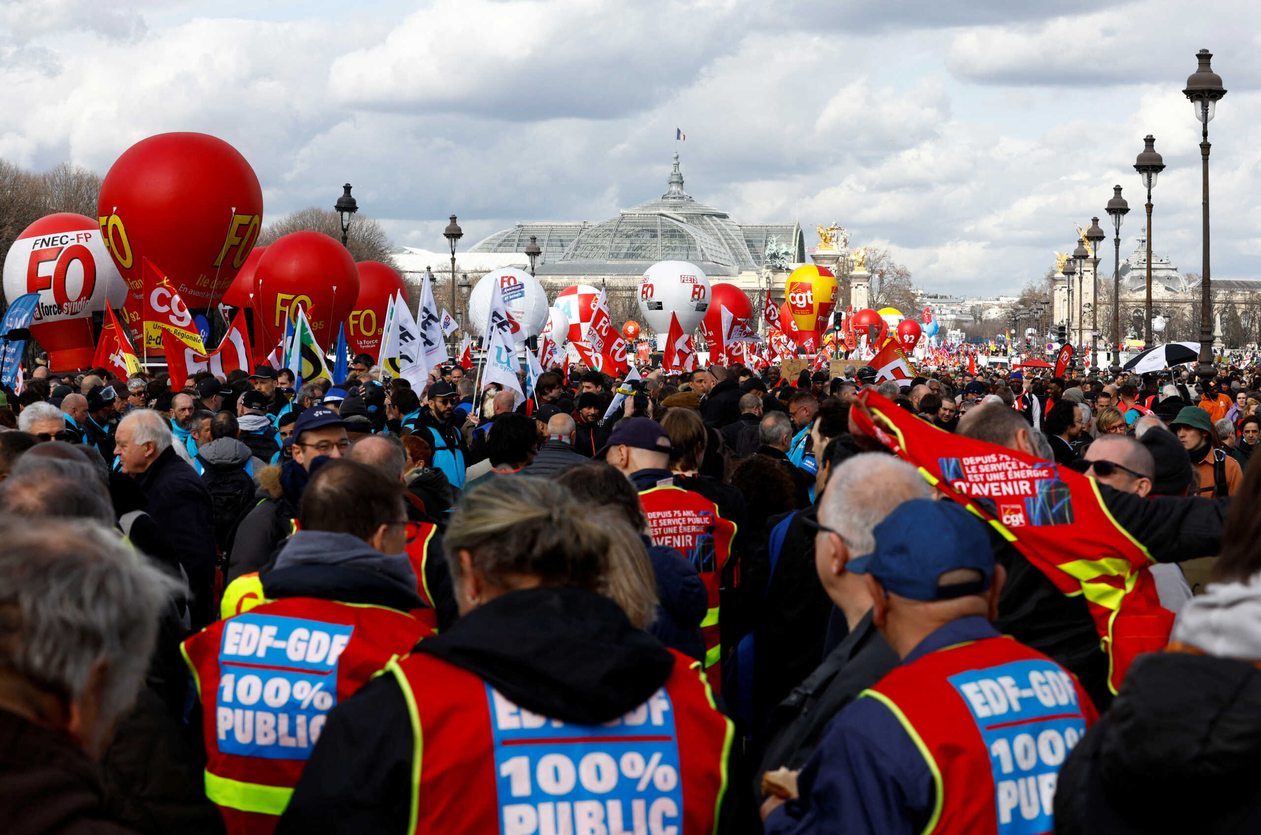 Protesters attend a demonstration against French government's pension reform plan in Paris, as part of the eighth day of national strike and protests in France, March 15, 2023. REUTERS