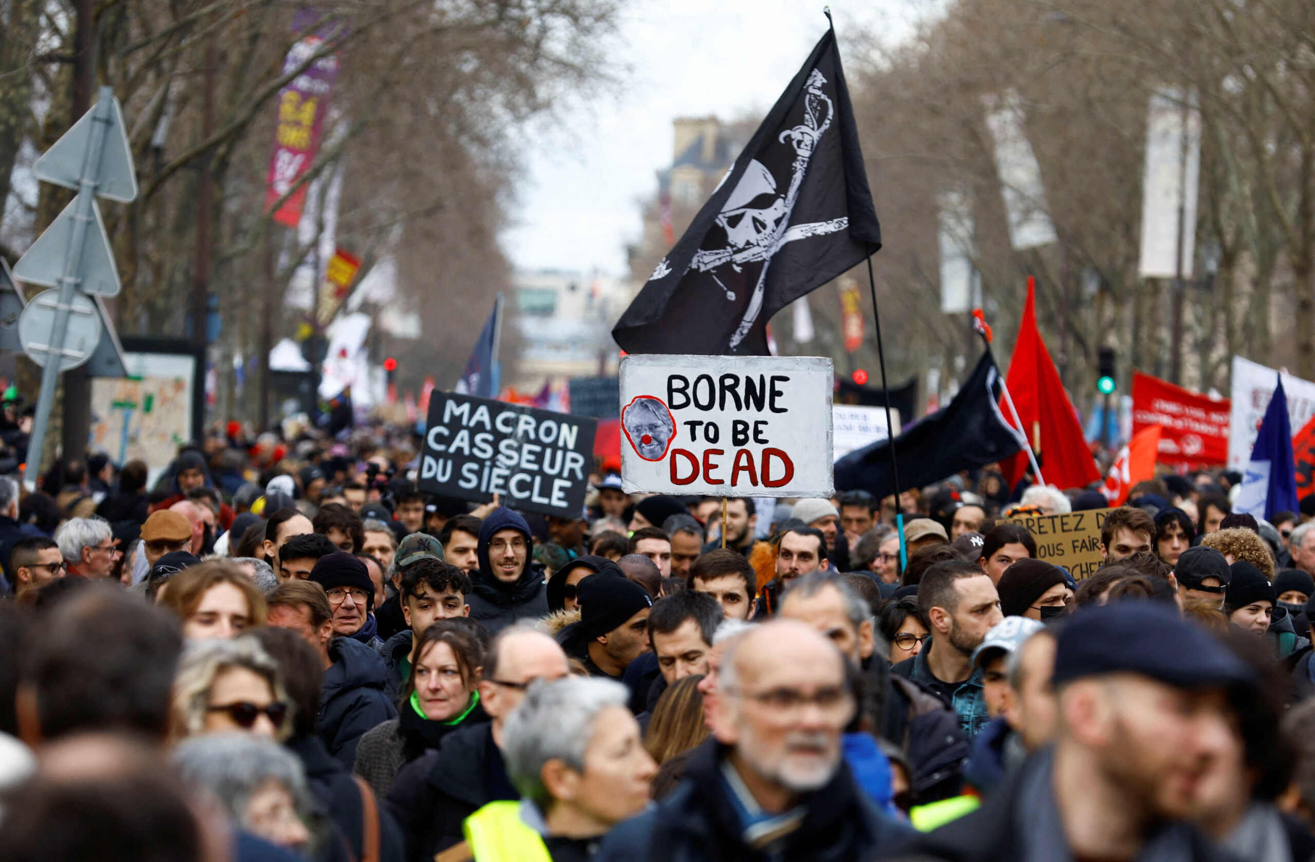 Protesters attend a demonstration against French government's pension reform plan in Paris, as part of the eighth day of national strike and protests in France, March 15, 2023. REUTERS